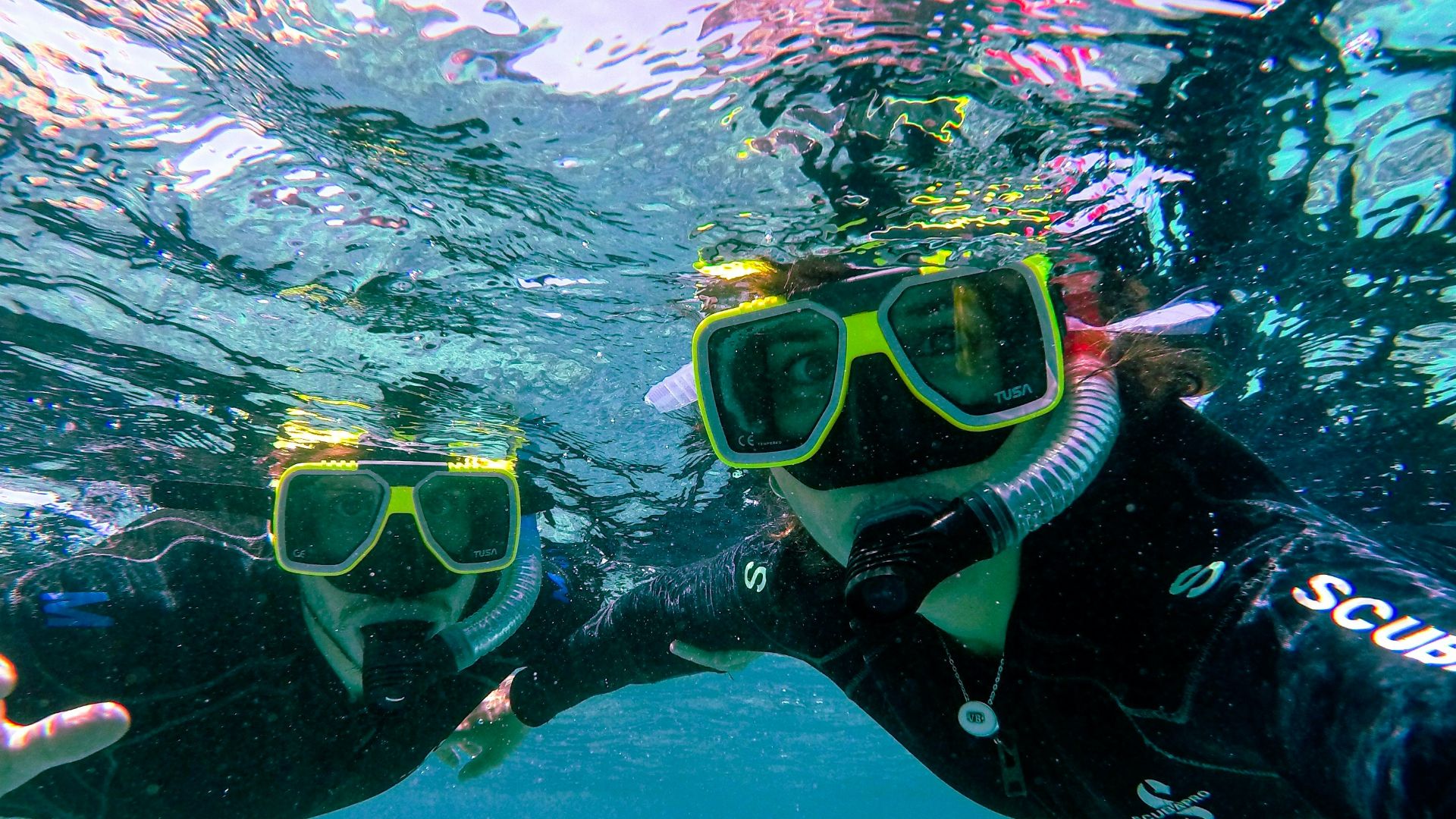 a person in scuba gear under water