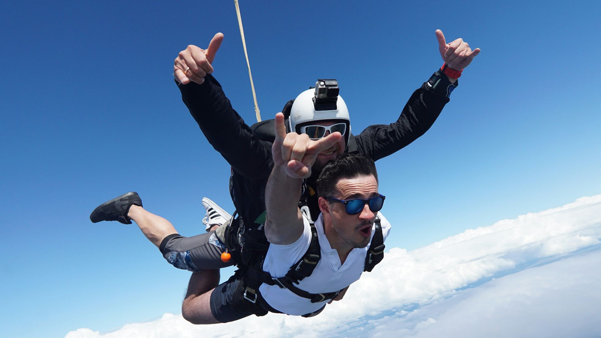 a man skydiving with a parachute