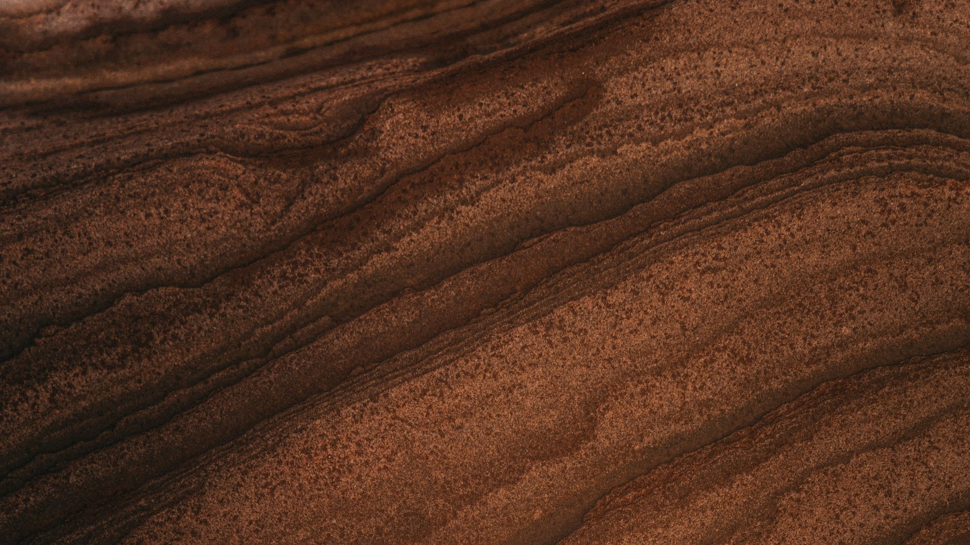 a close up of a brown sand dune