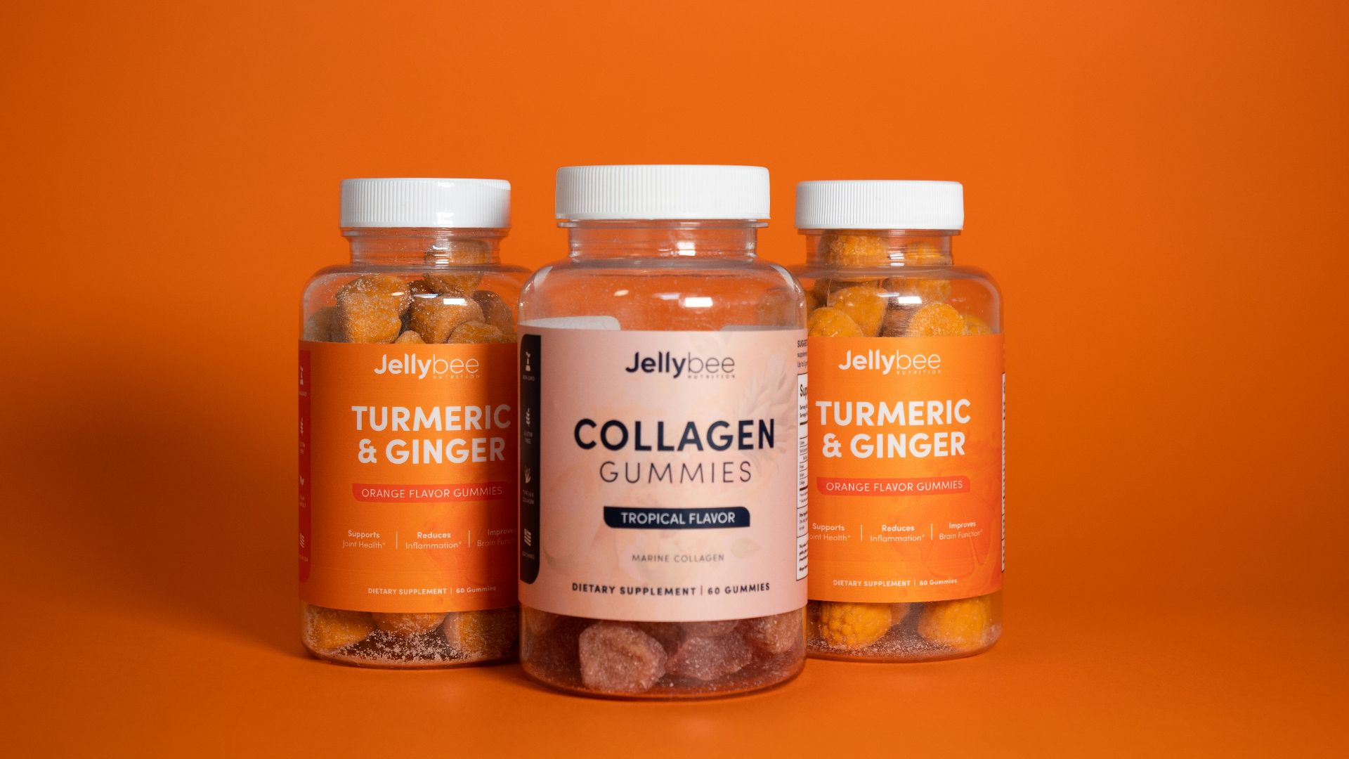 2 brown and white labeled bottles