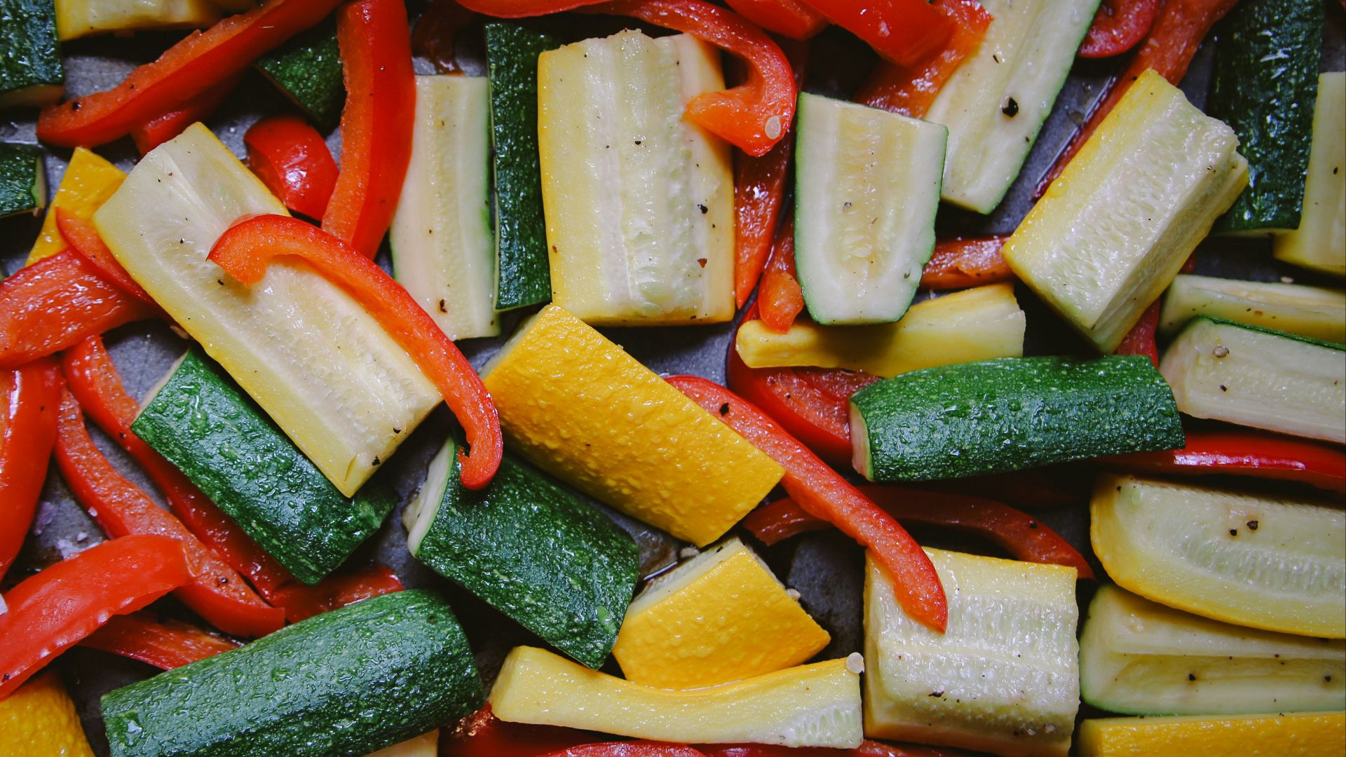 a pile of sliced up vegetables sitting on top of a table