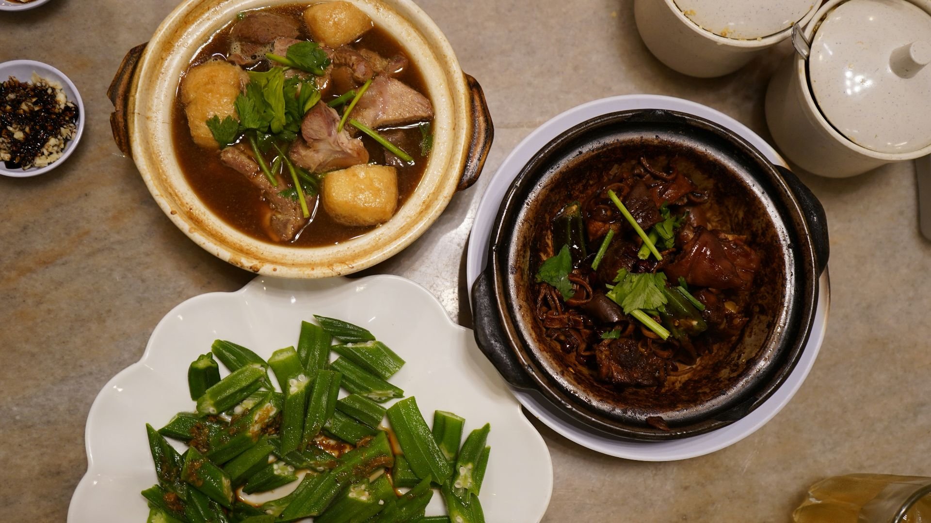 a table with bowls of food