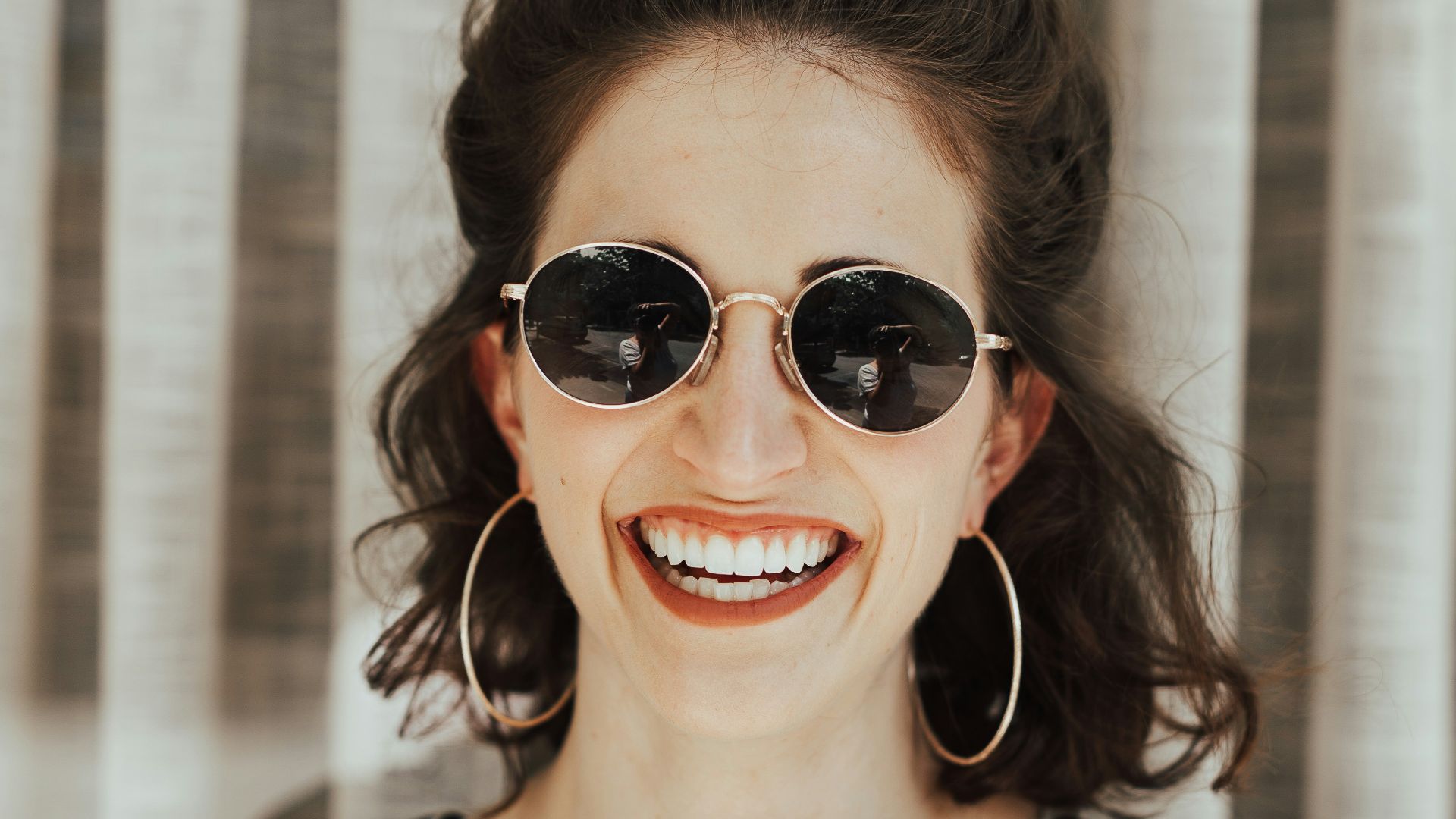 woman wearing white and black rompers and black top