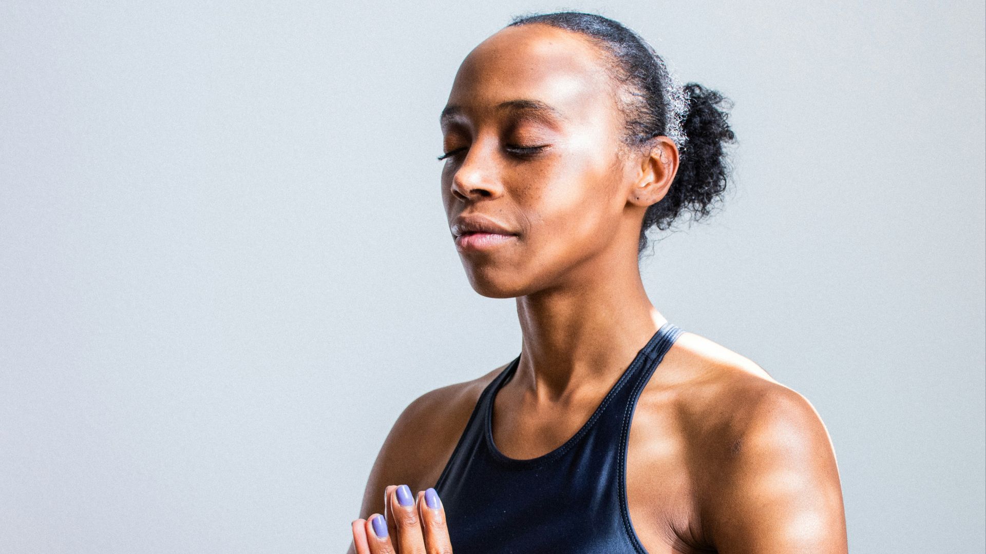 woman wearing black sports bra