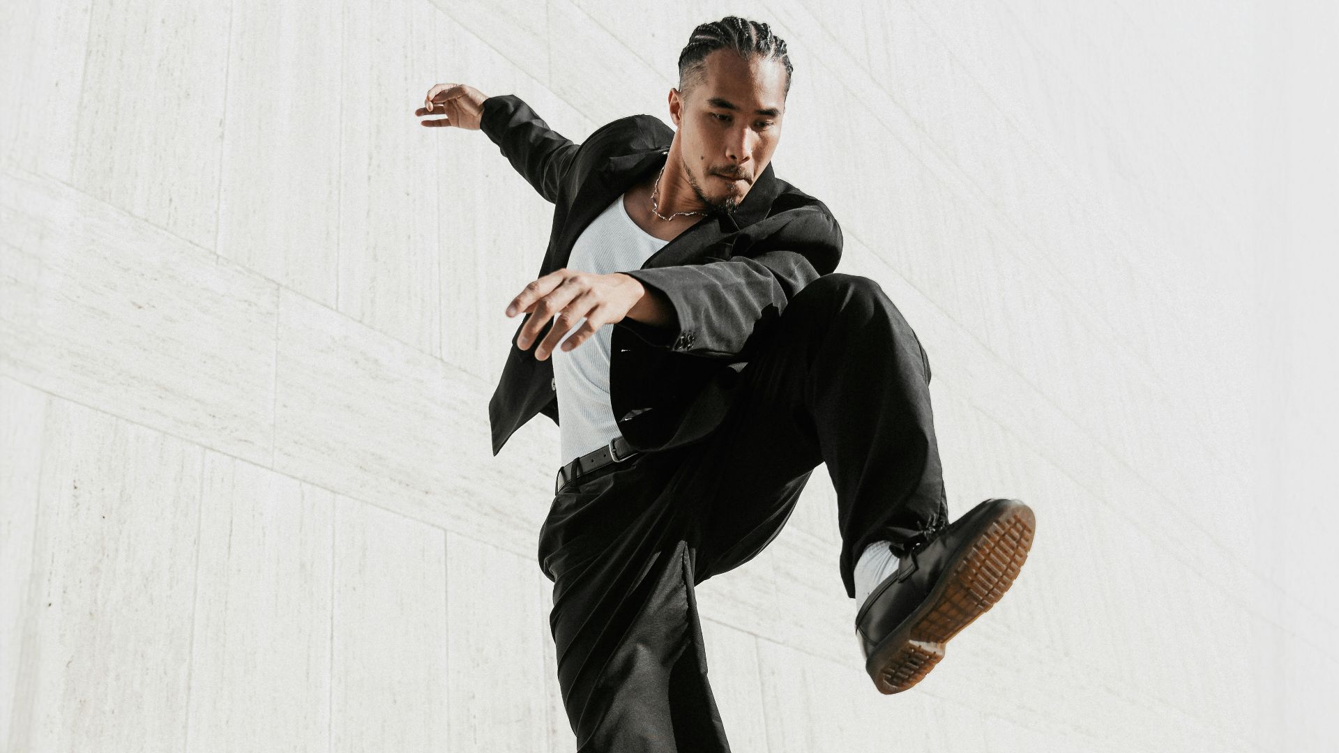 a man is doing a trick on a skateboard