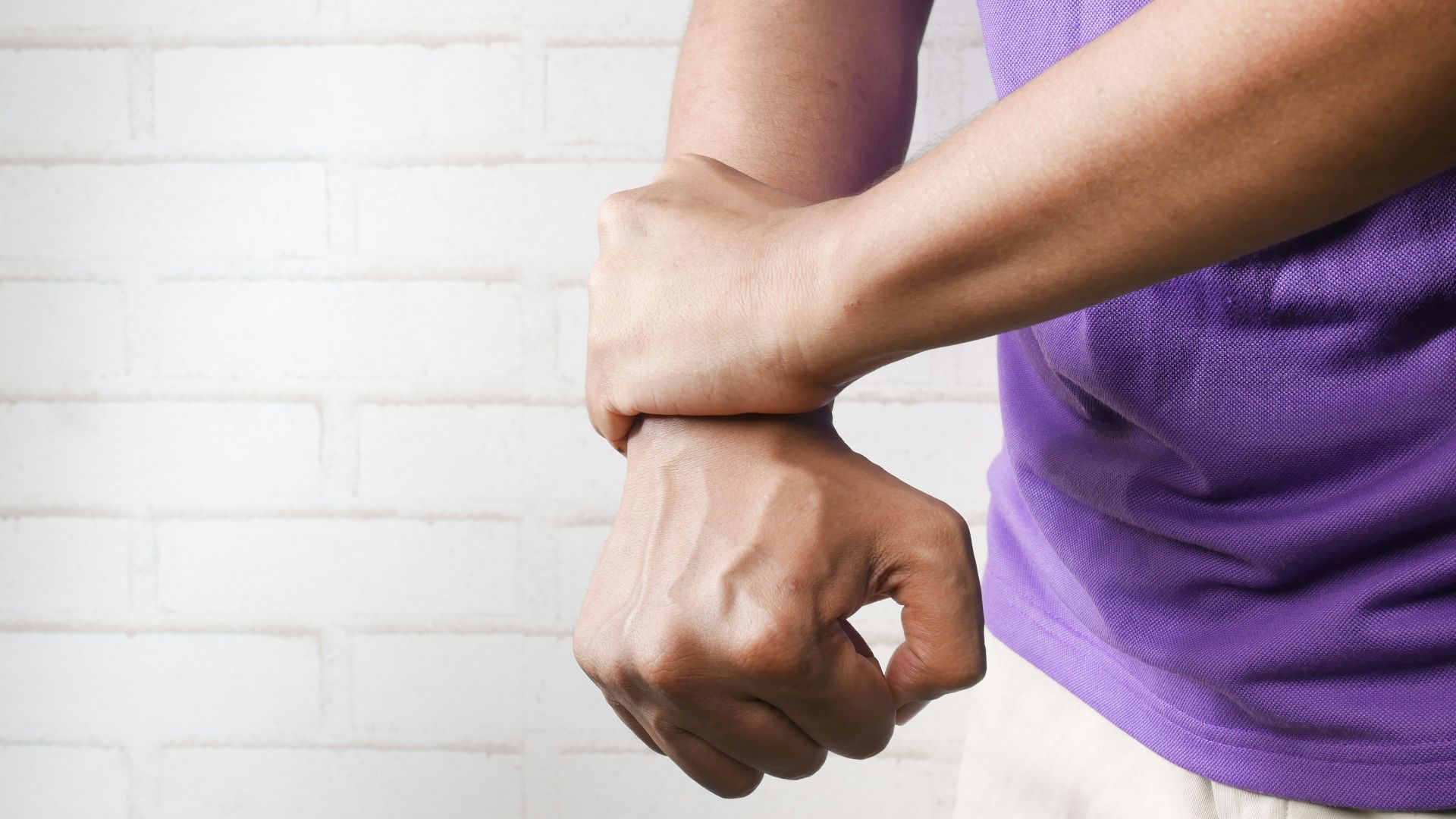 person holding hands of another person