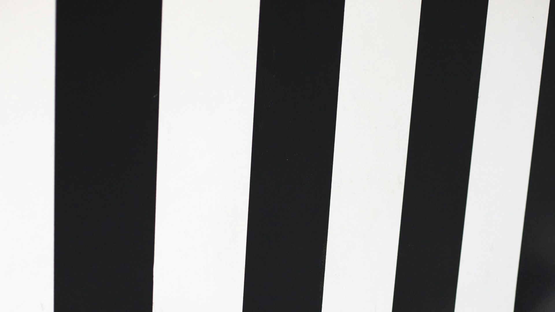 a black and white checkered floor and wall