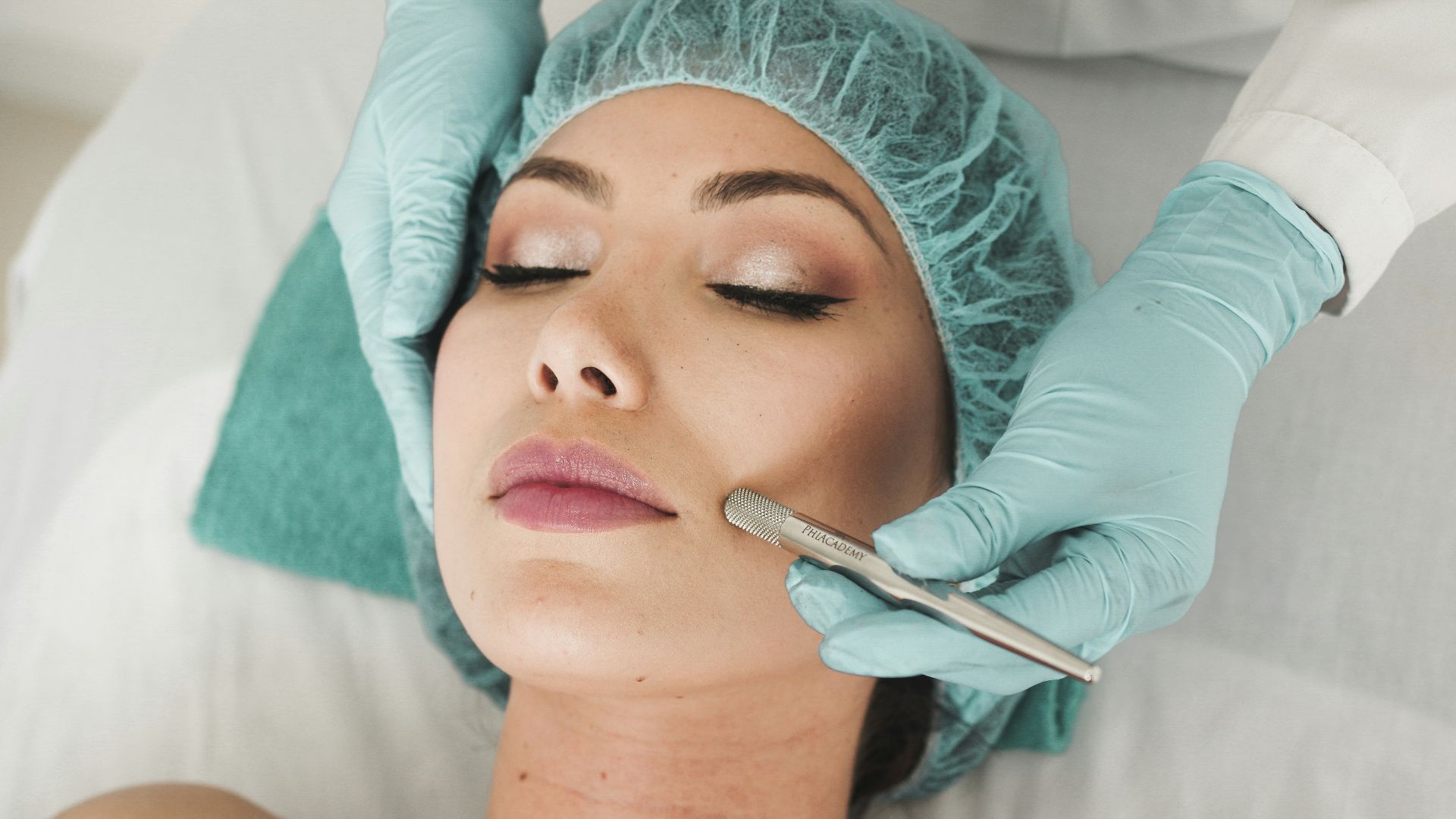 woman doing liposuction on her face