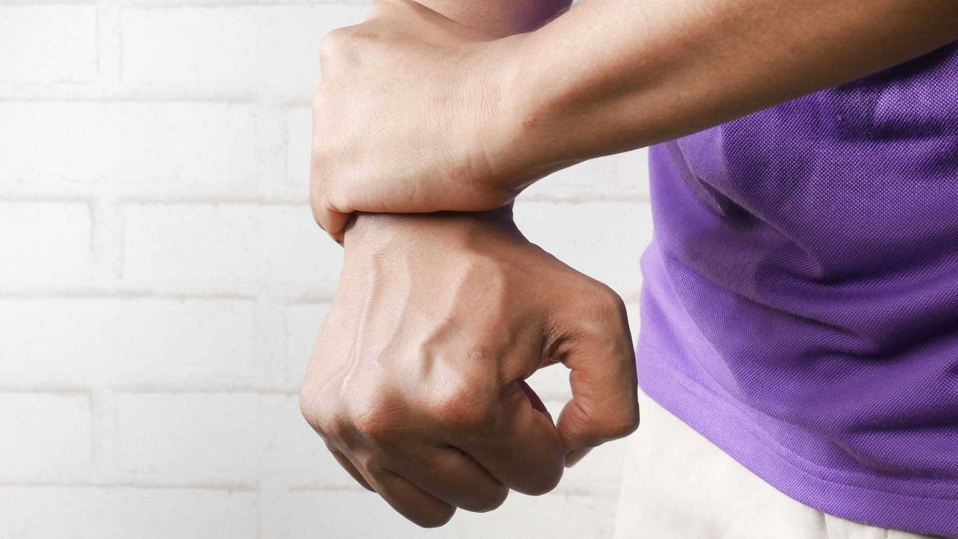 person holding hands of another person