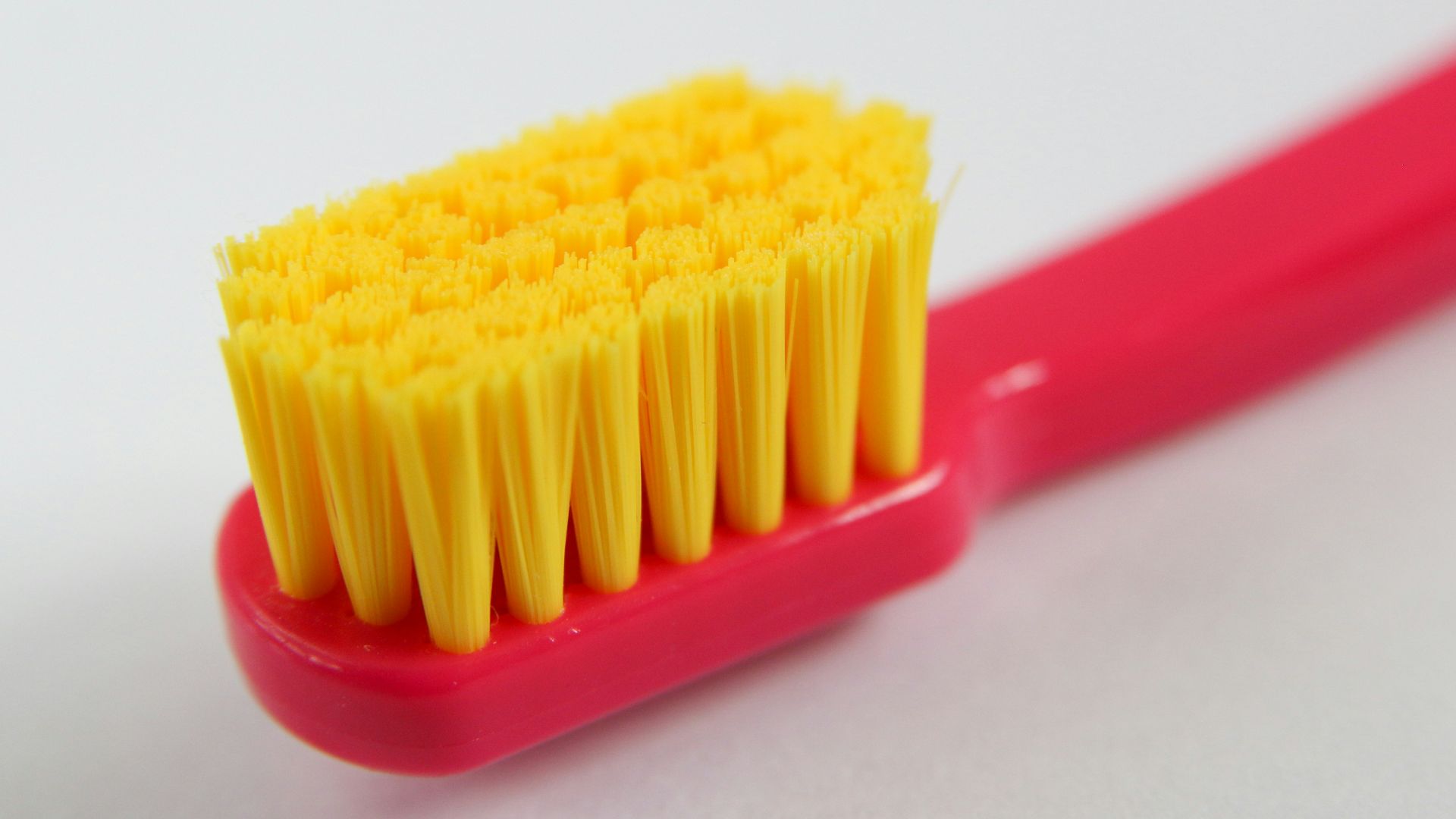 yellow and red plastic straw