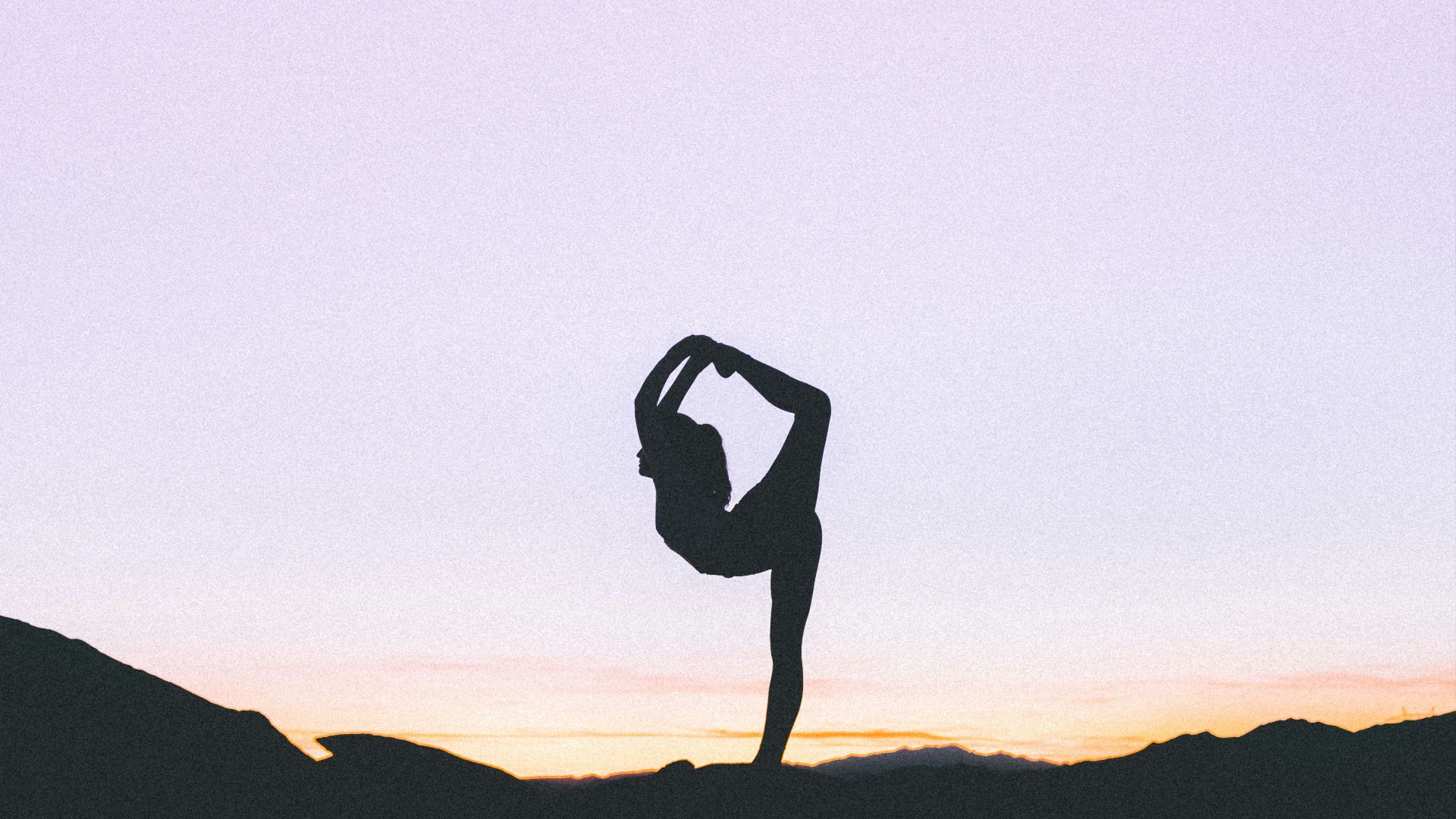 woman standing with her one leg