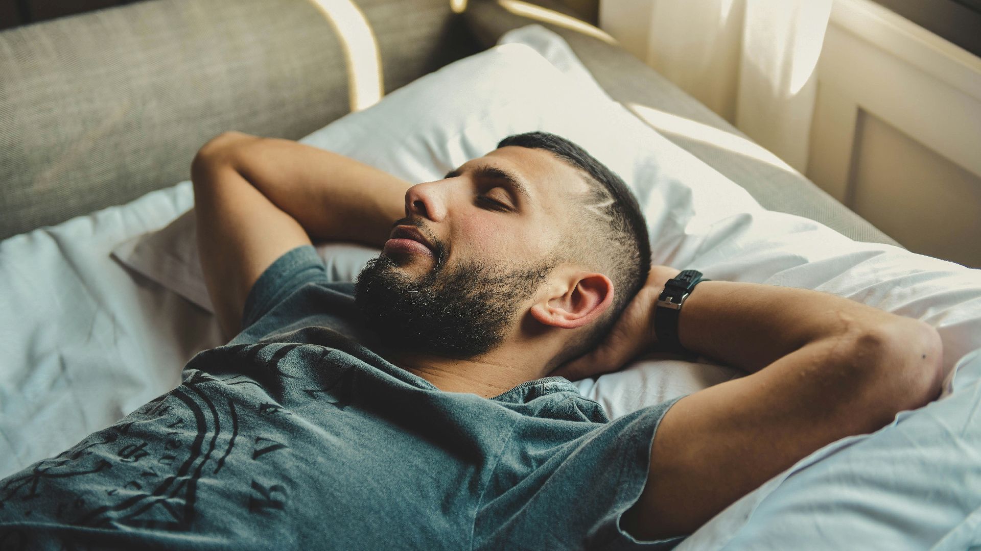 man lying on bed