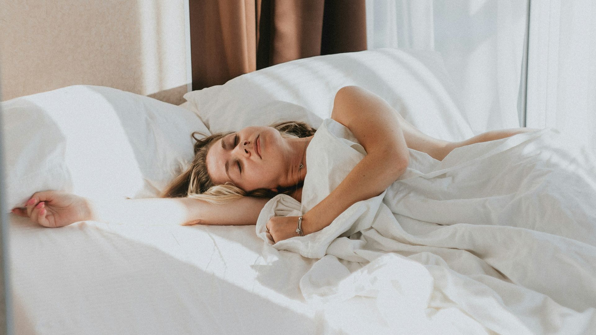 a person lying in a bed