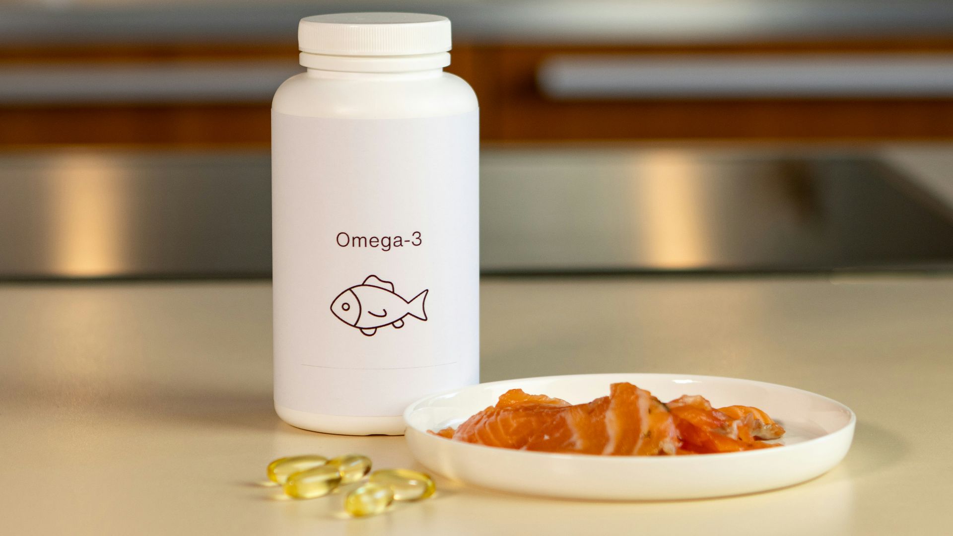 a bowl of fish next to a bottle of vitamins