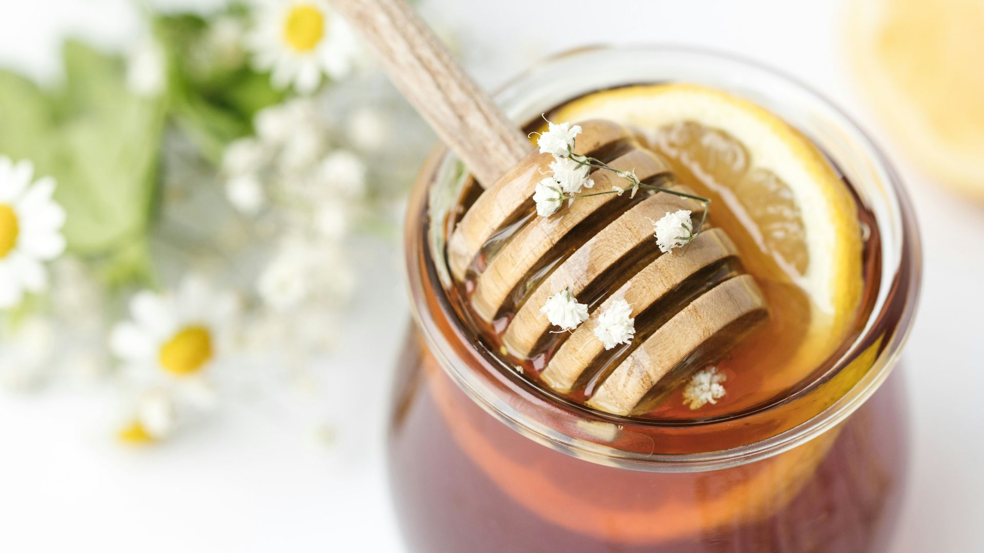 honey in glass on tabel