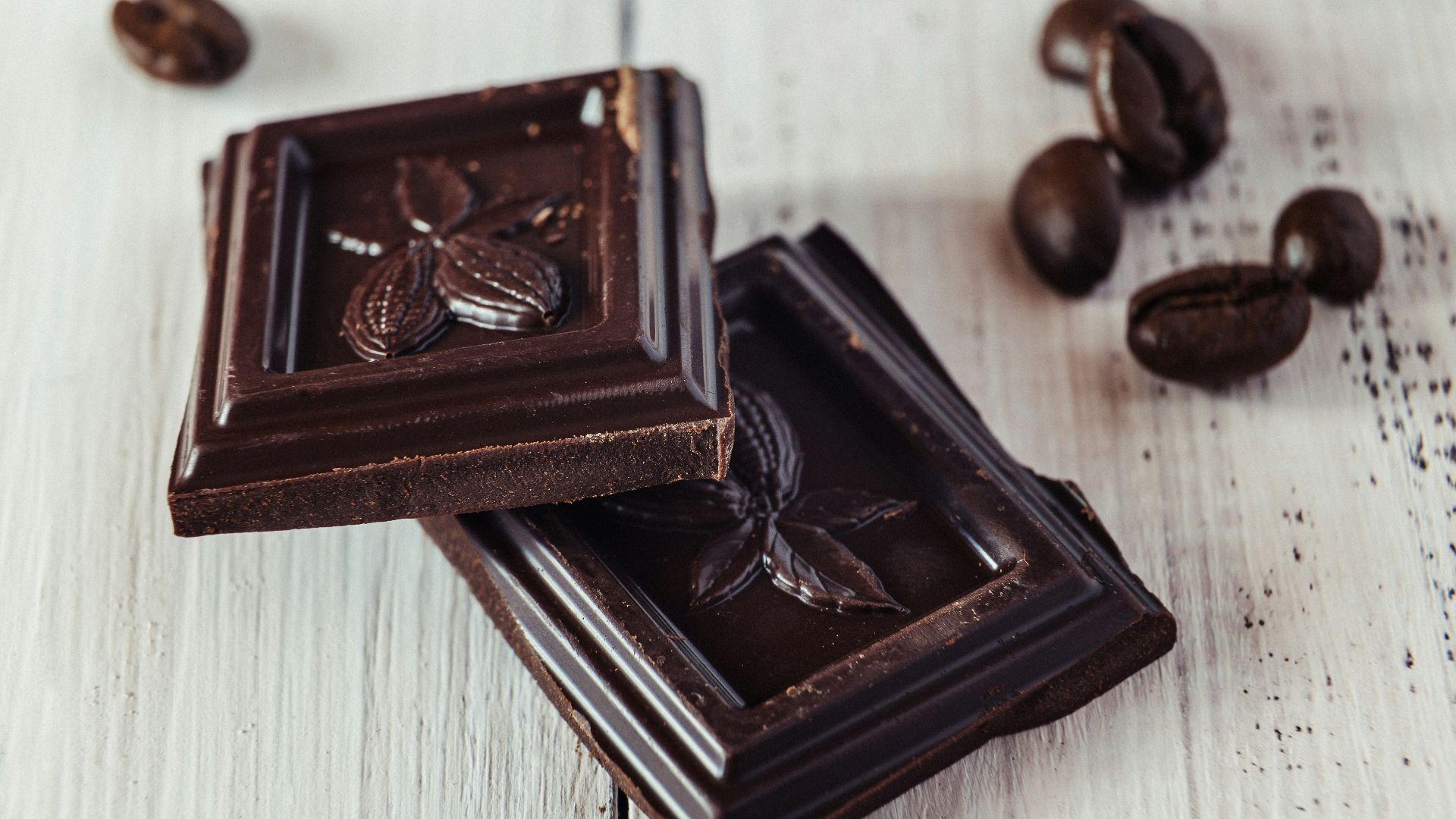 a couple of pieces of chocolate sitting on top of a table