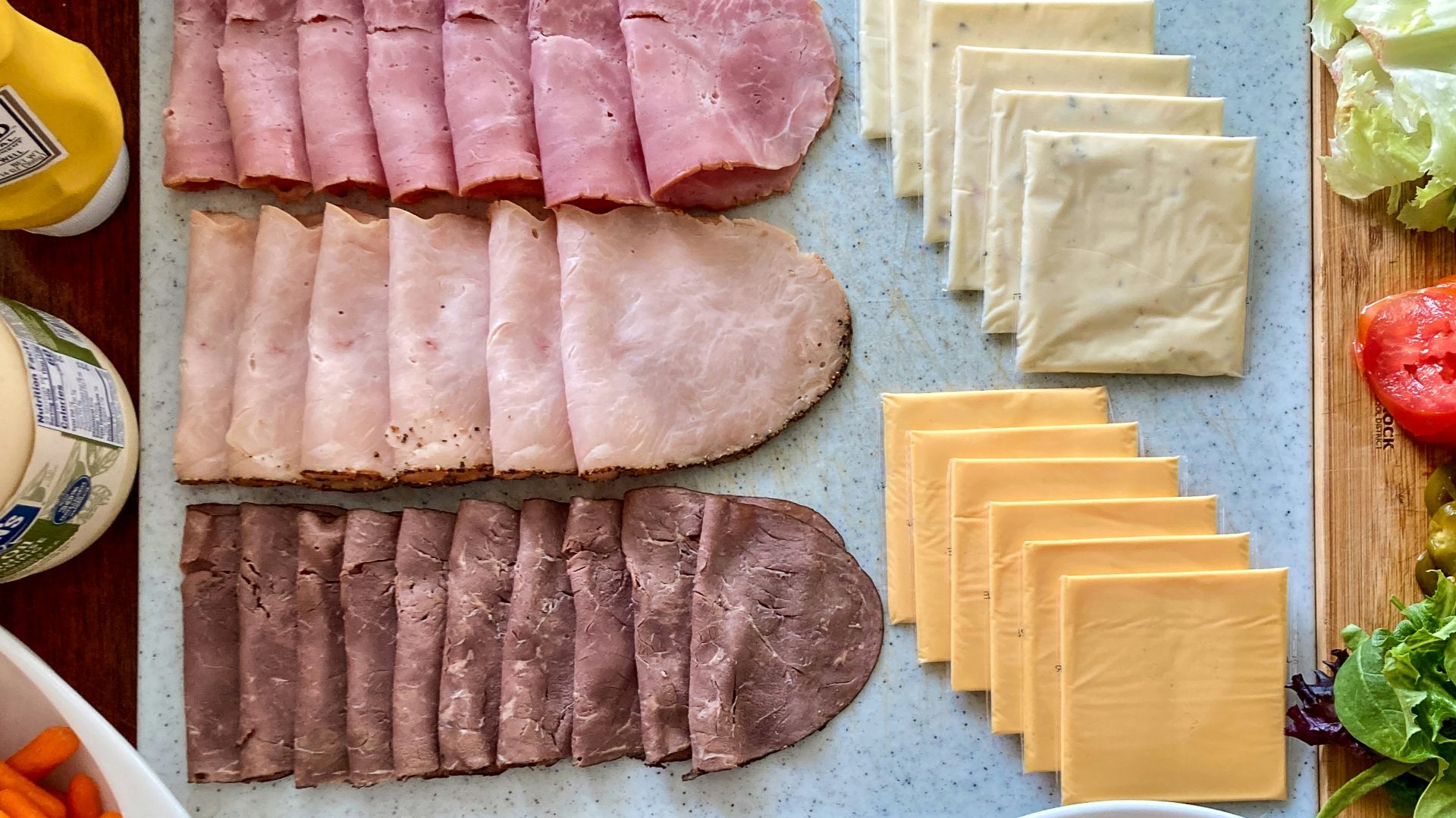 a variety of food is laid out on a table