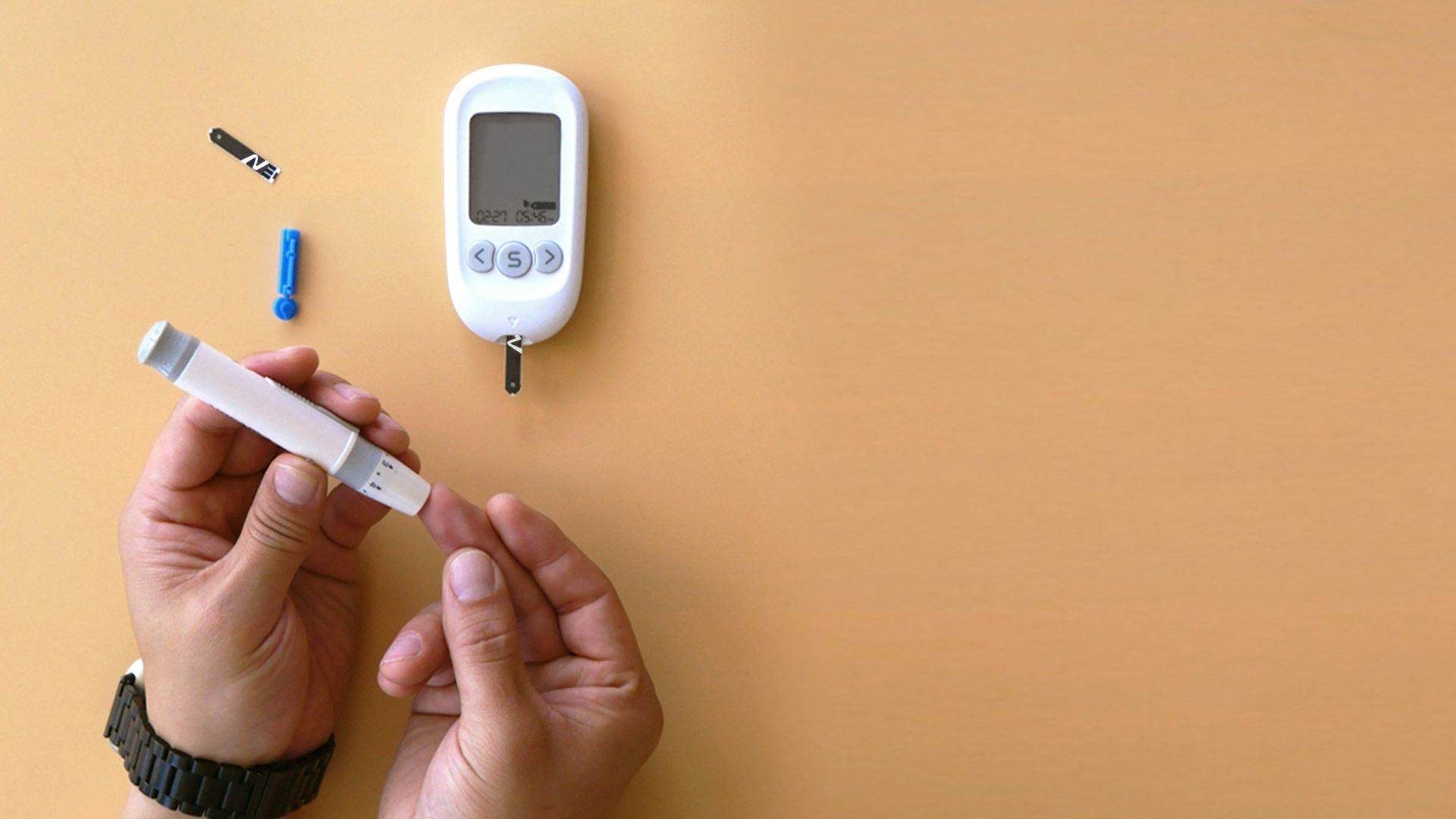 a person holding a thermometer next to an electronic device