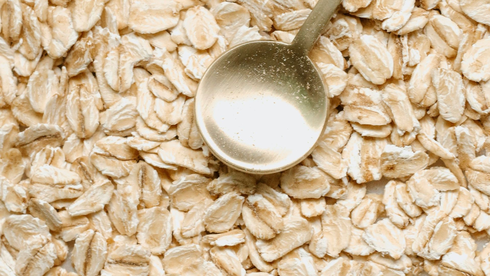 silver spoon on white rice