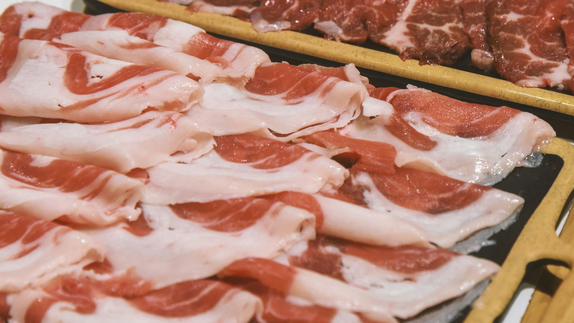 a knife cutting meat