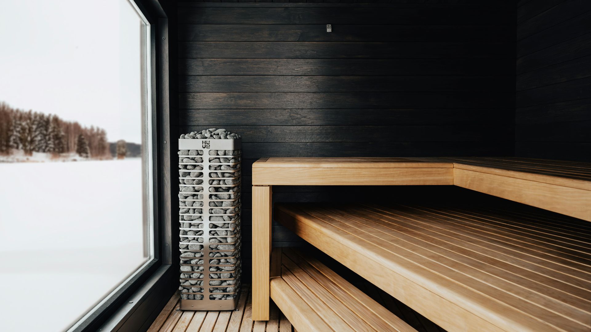 a wooden bench sitting next to a window