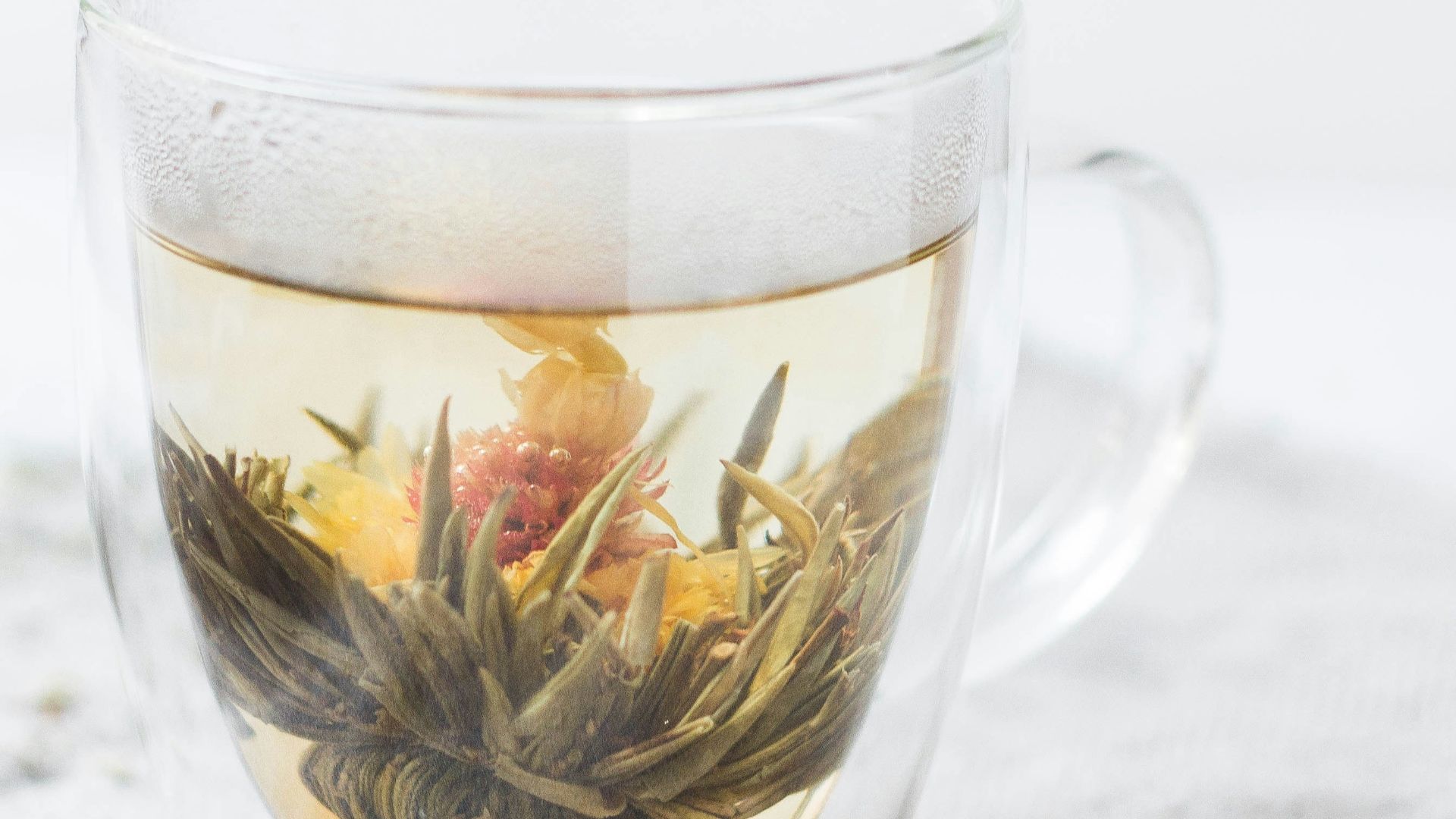 photo of clear glass mug