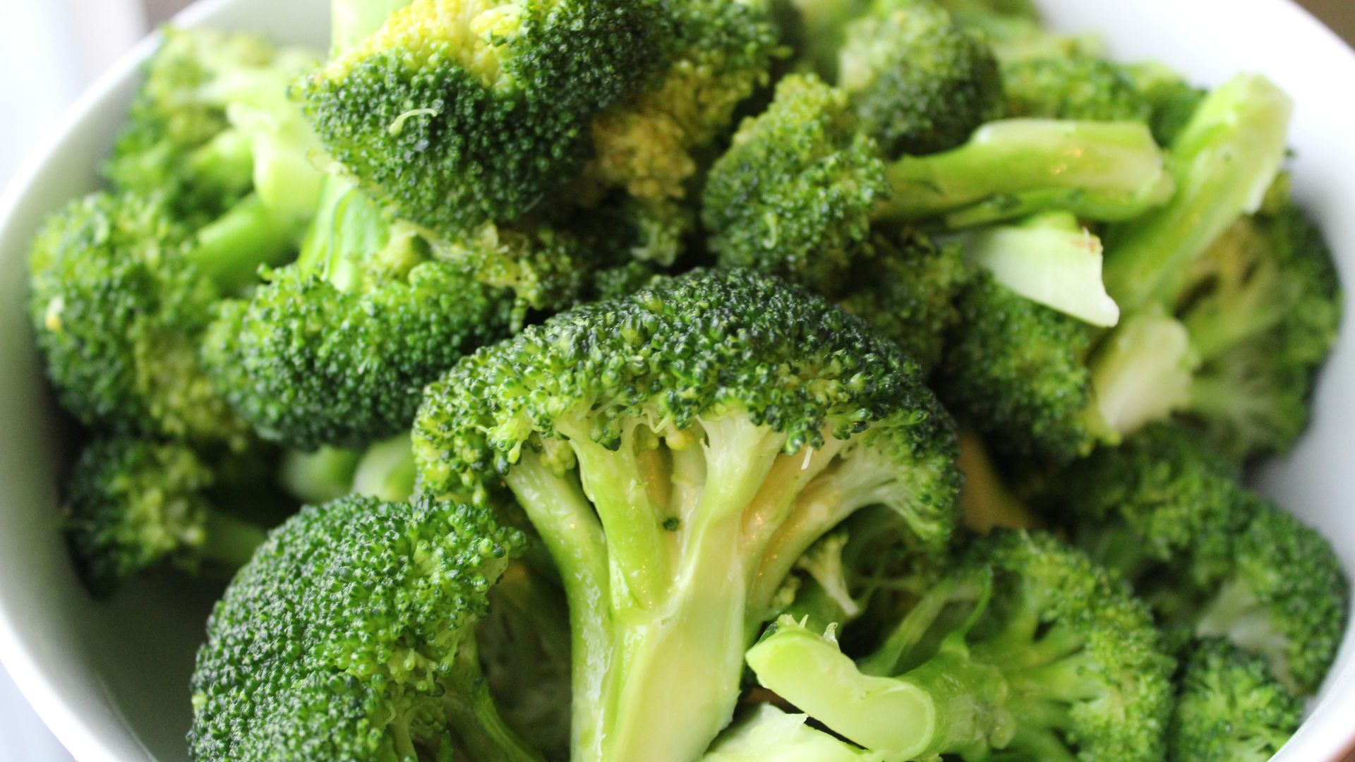 green broccoli on white ceramic plate
