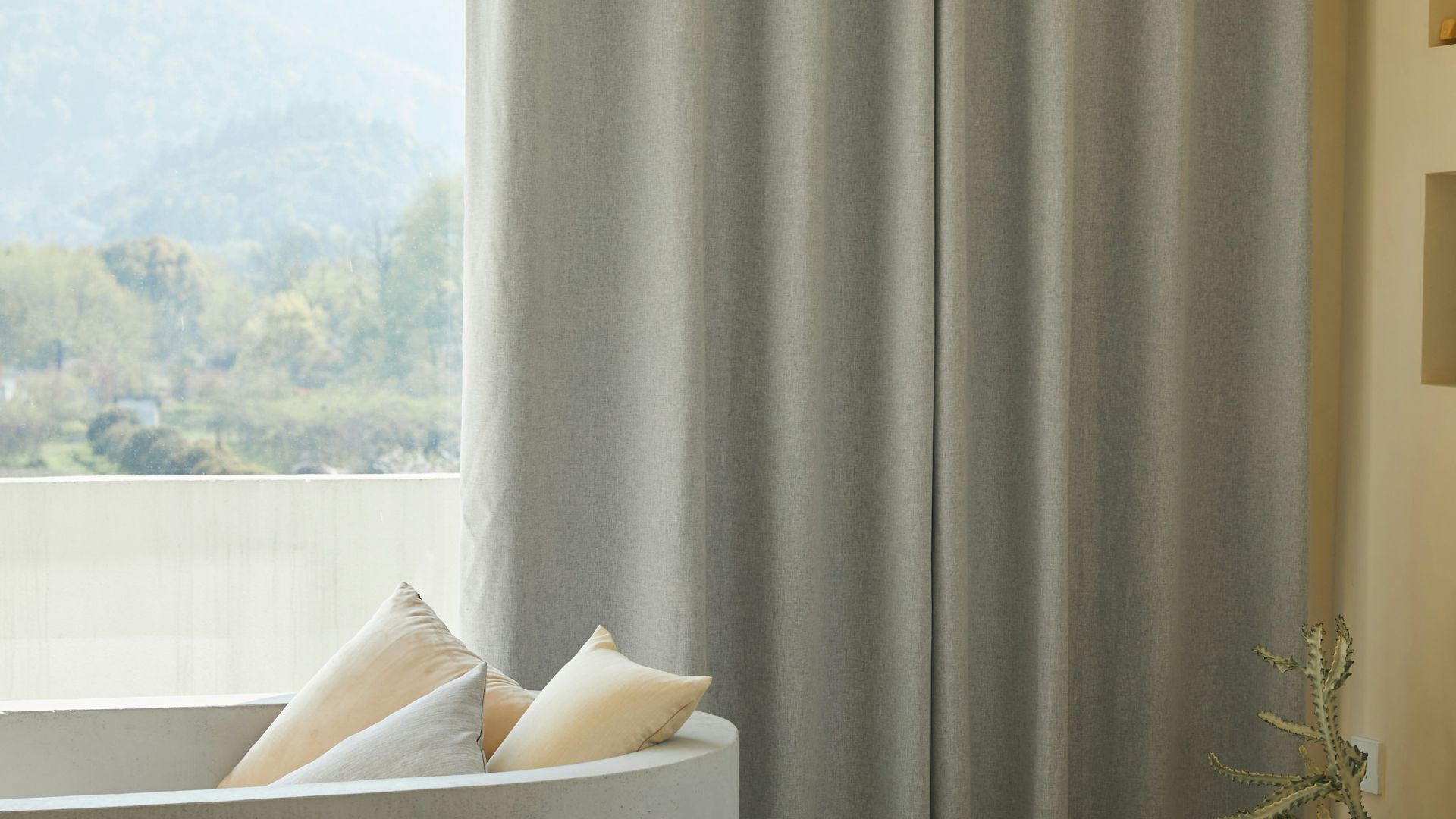 white throw pillow on white couch