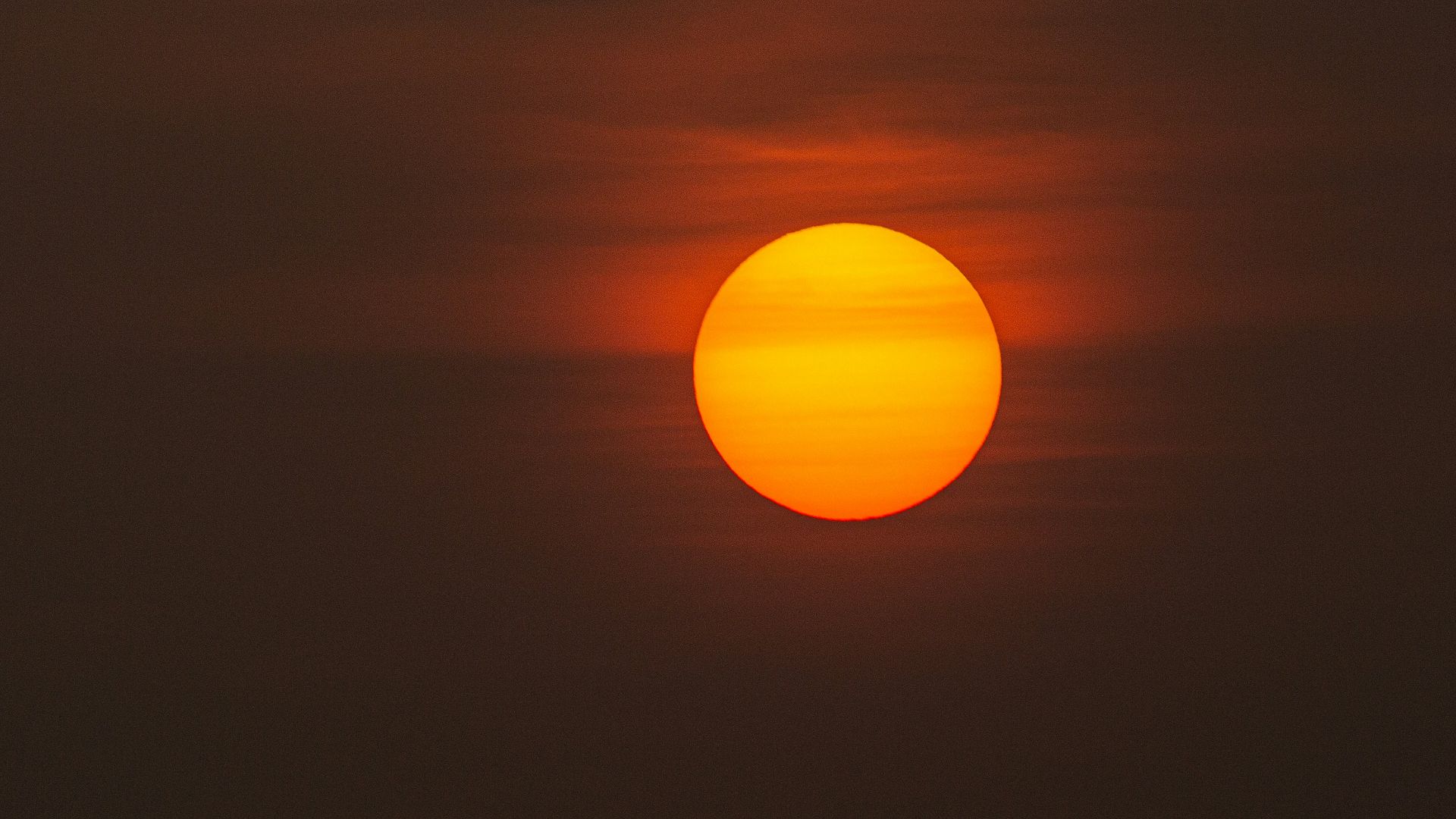 low-light photo of sun