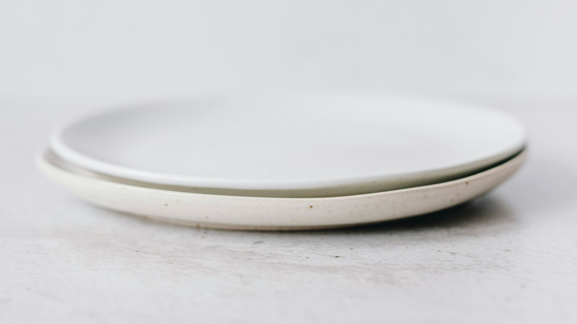 white round plate on white table