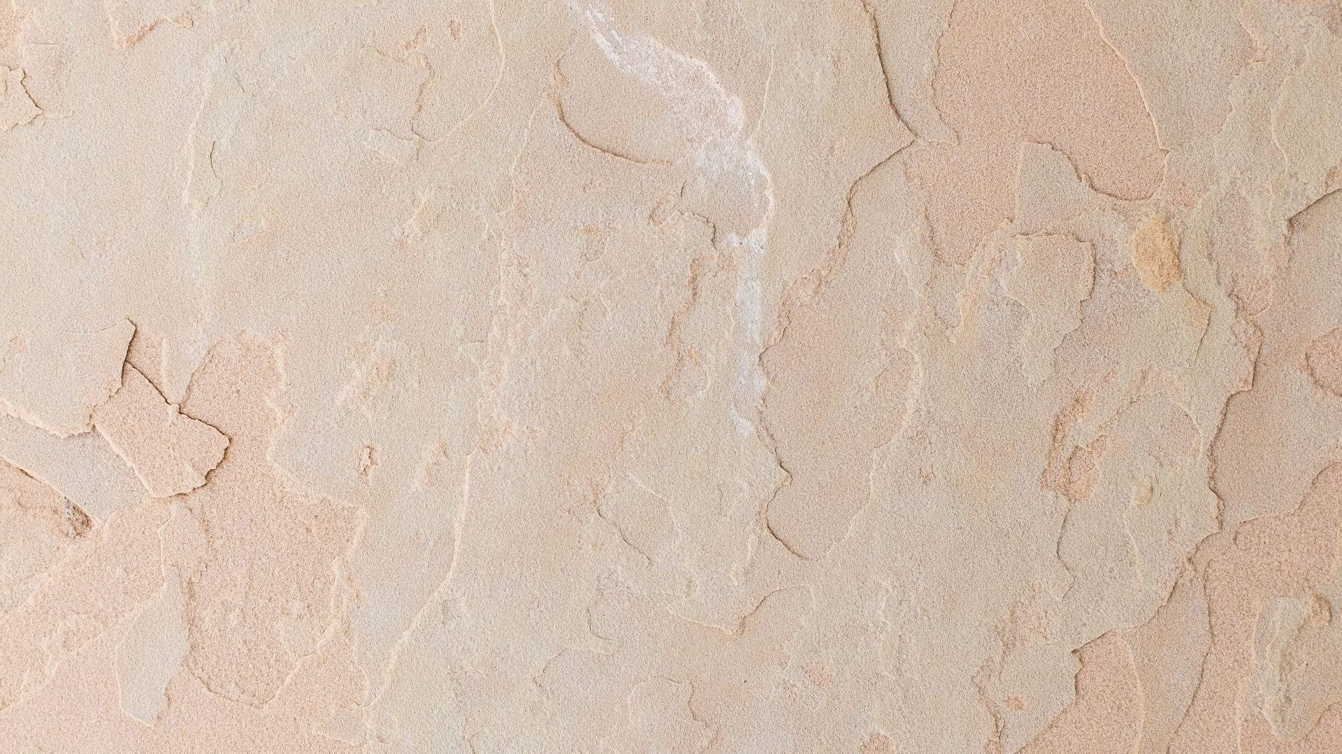 a close up of a wall with some paint on it