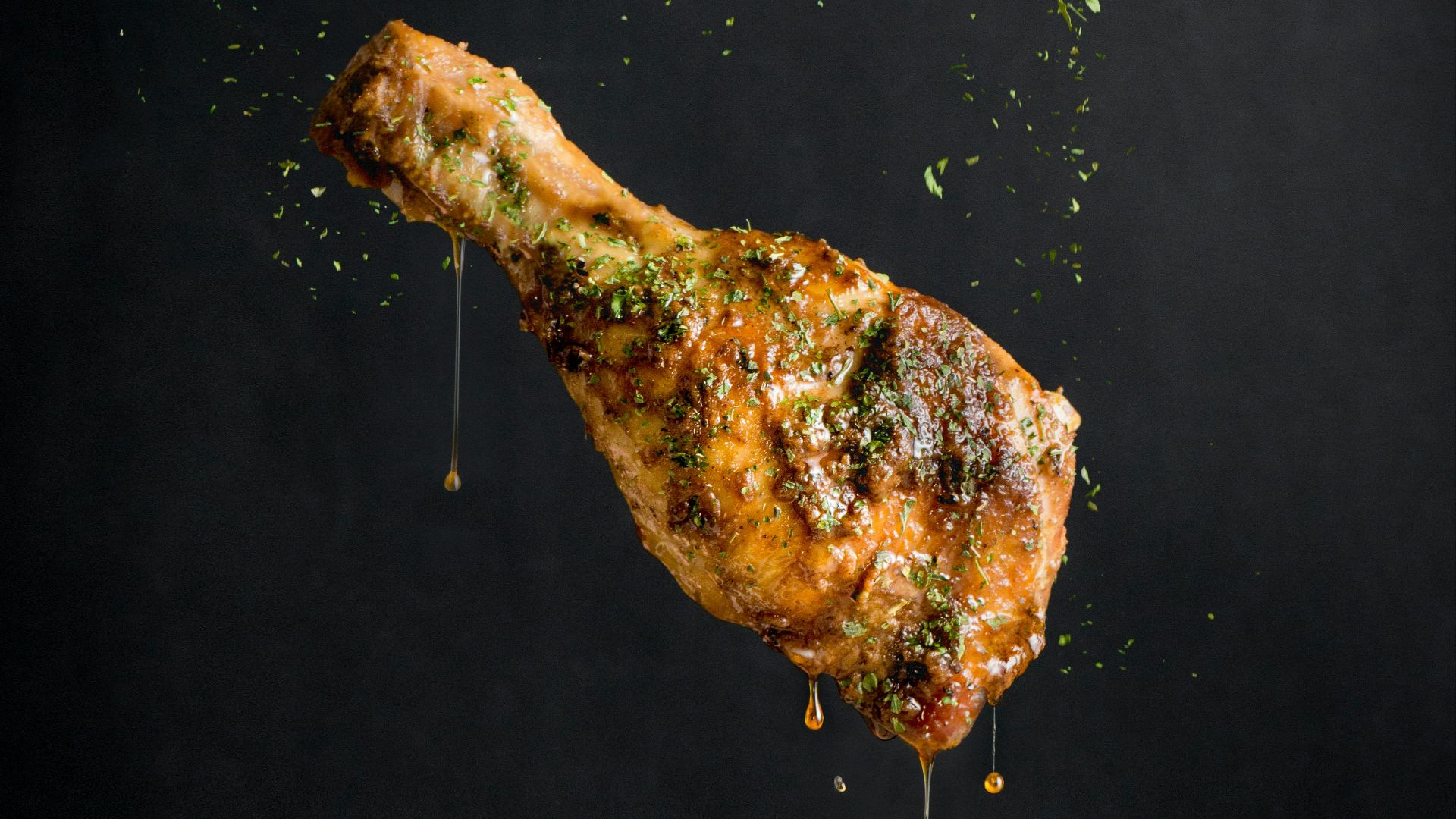 a piece of meat with sprinkles on it