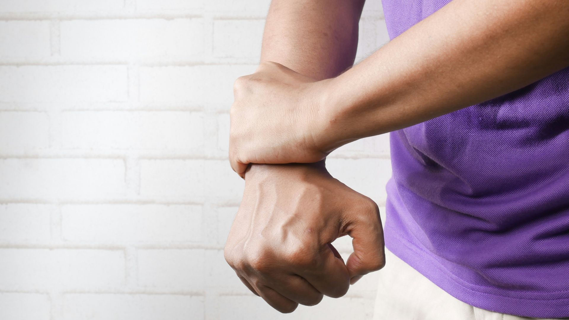 person holding hands of another person