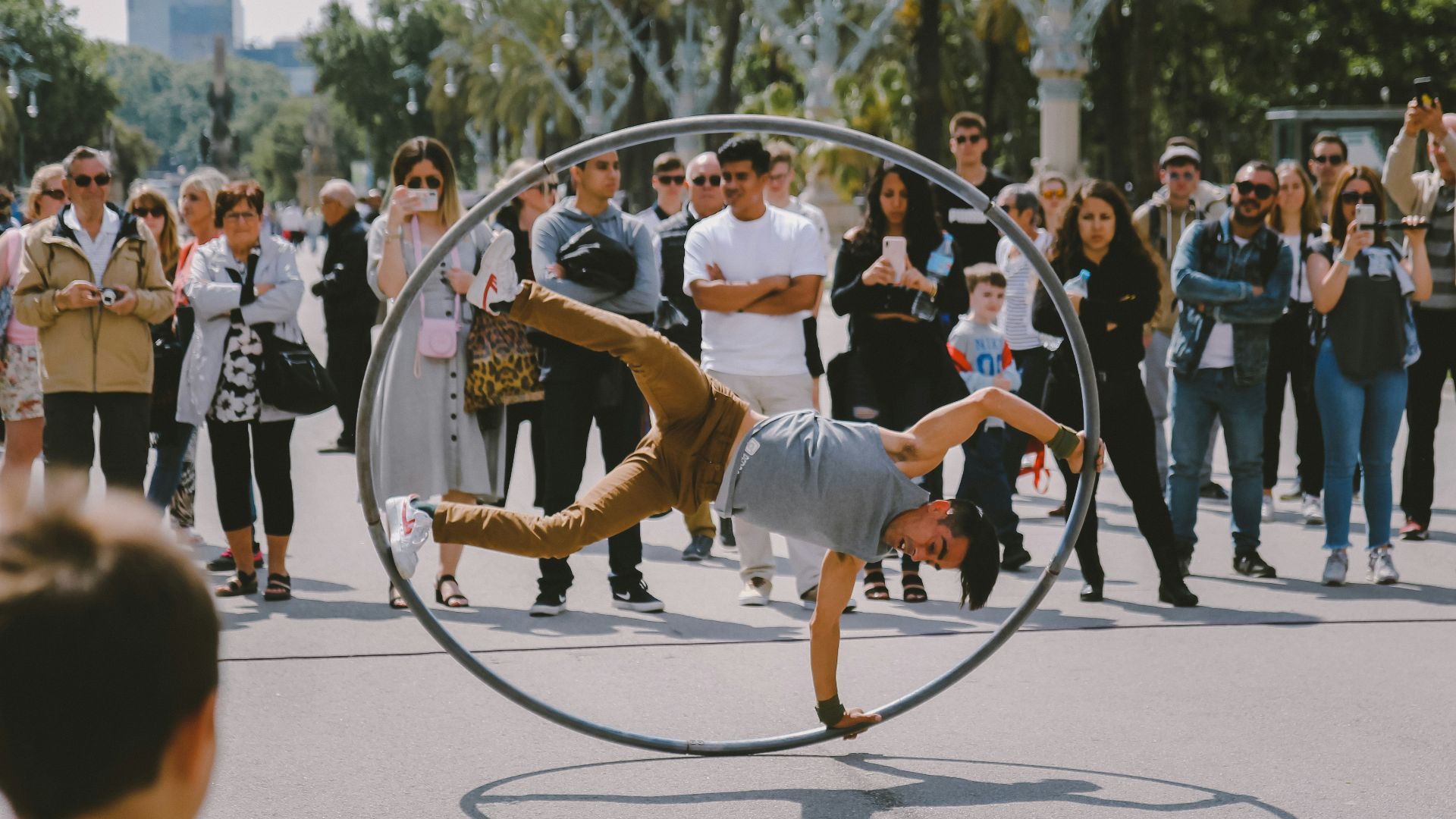 man wears gray tank top