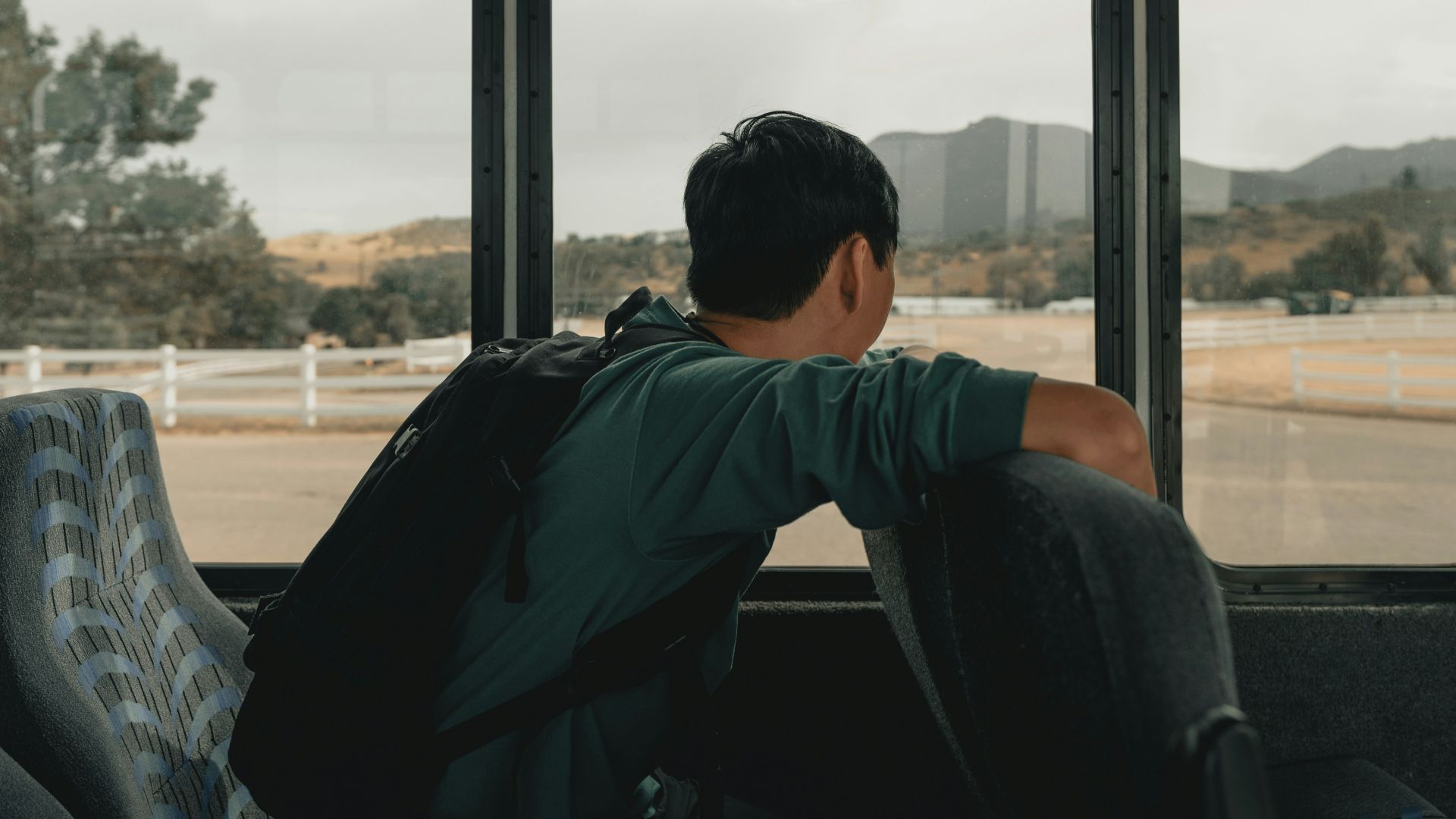 man sitting inside vehicle