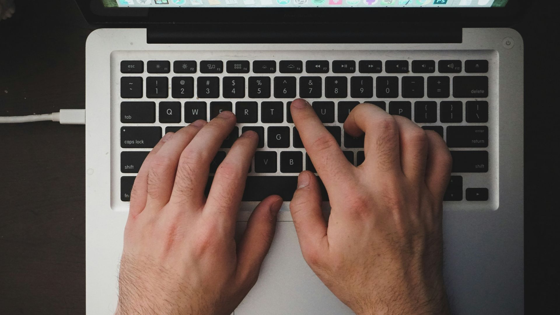 person using MacBook