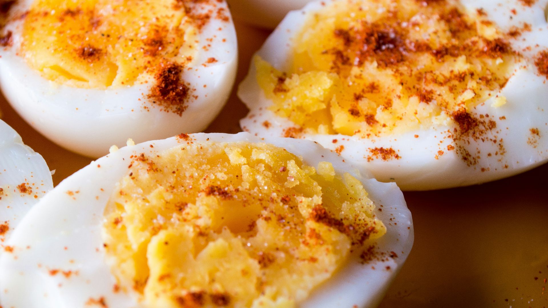 sliced boiled eggs topped with spices