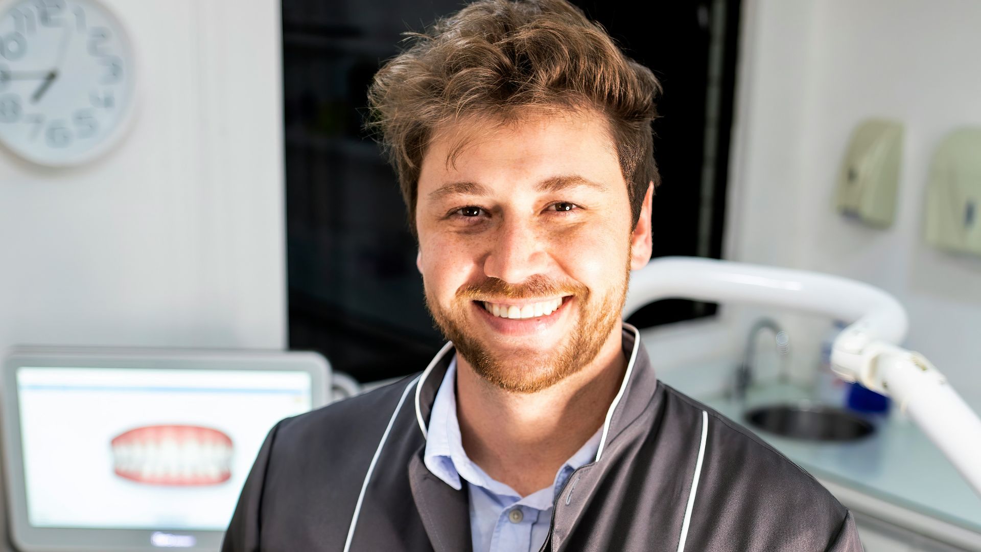 a man smiling for the camera