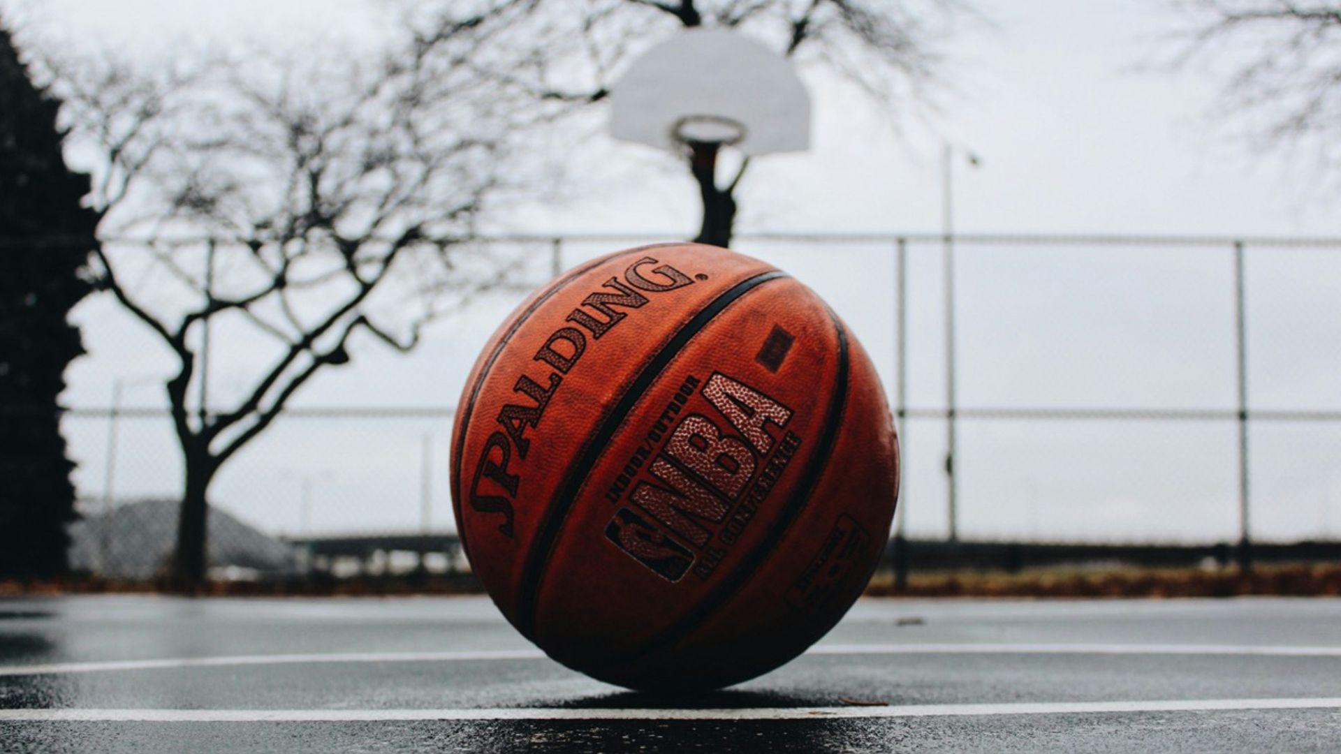 Spalding basketball in court