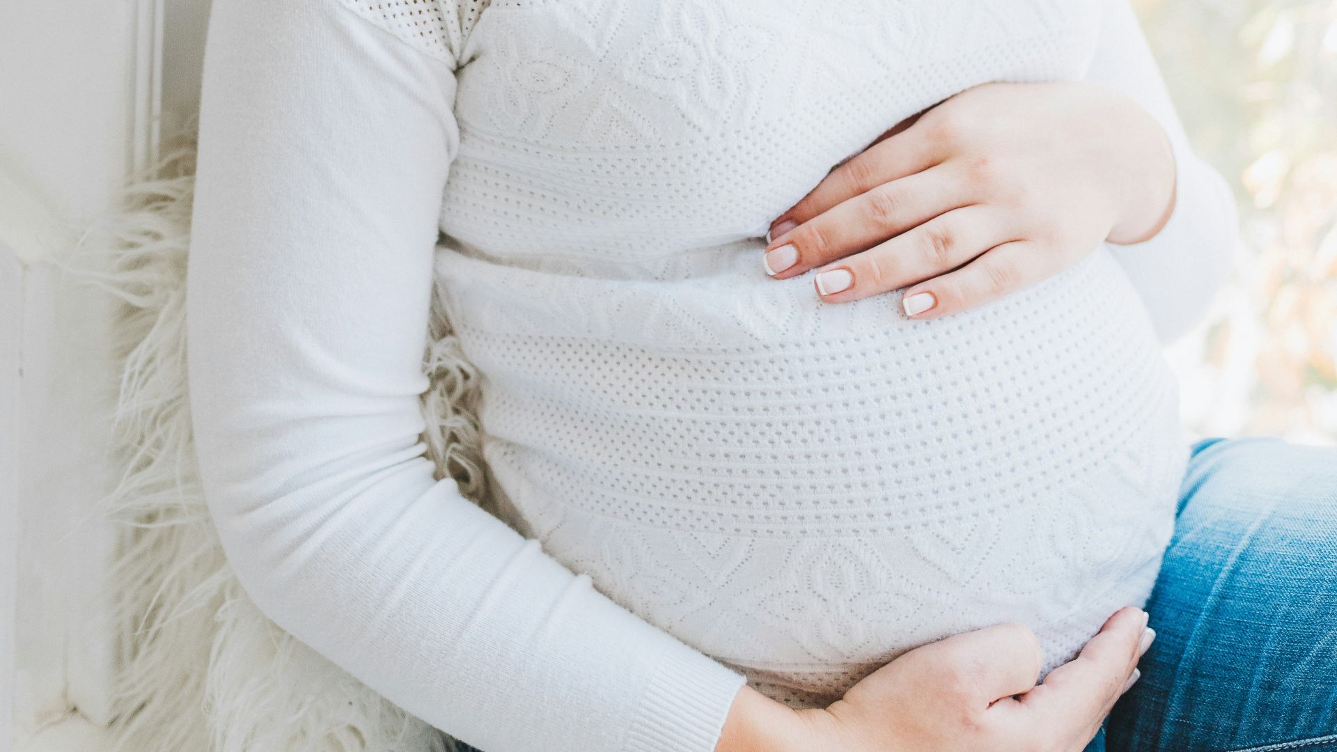 woman in white long sleeve shirt