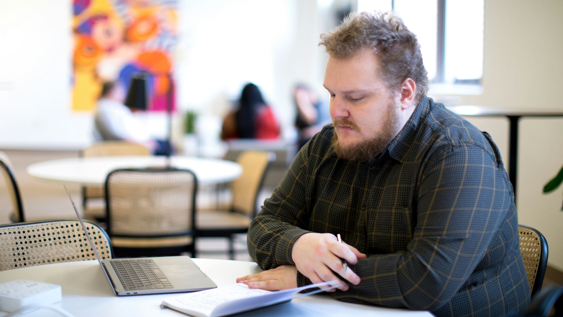 man wearing black dress shirt