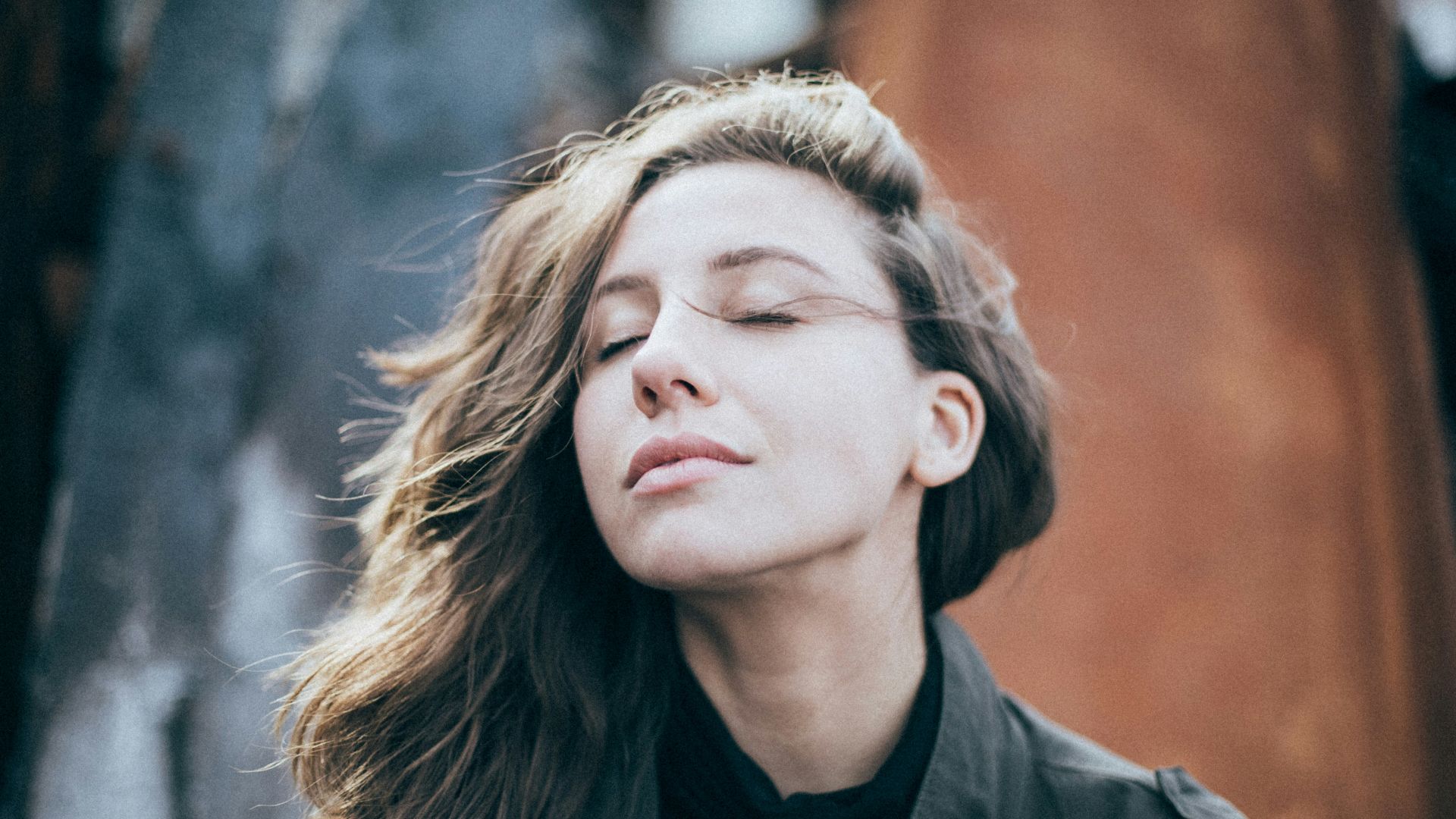closeup photo of woman wearing black top