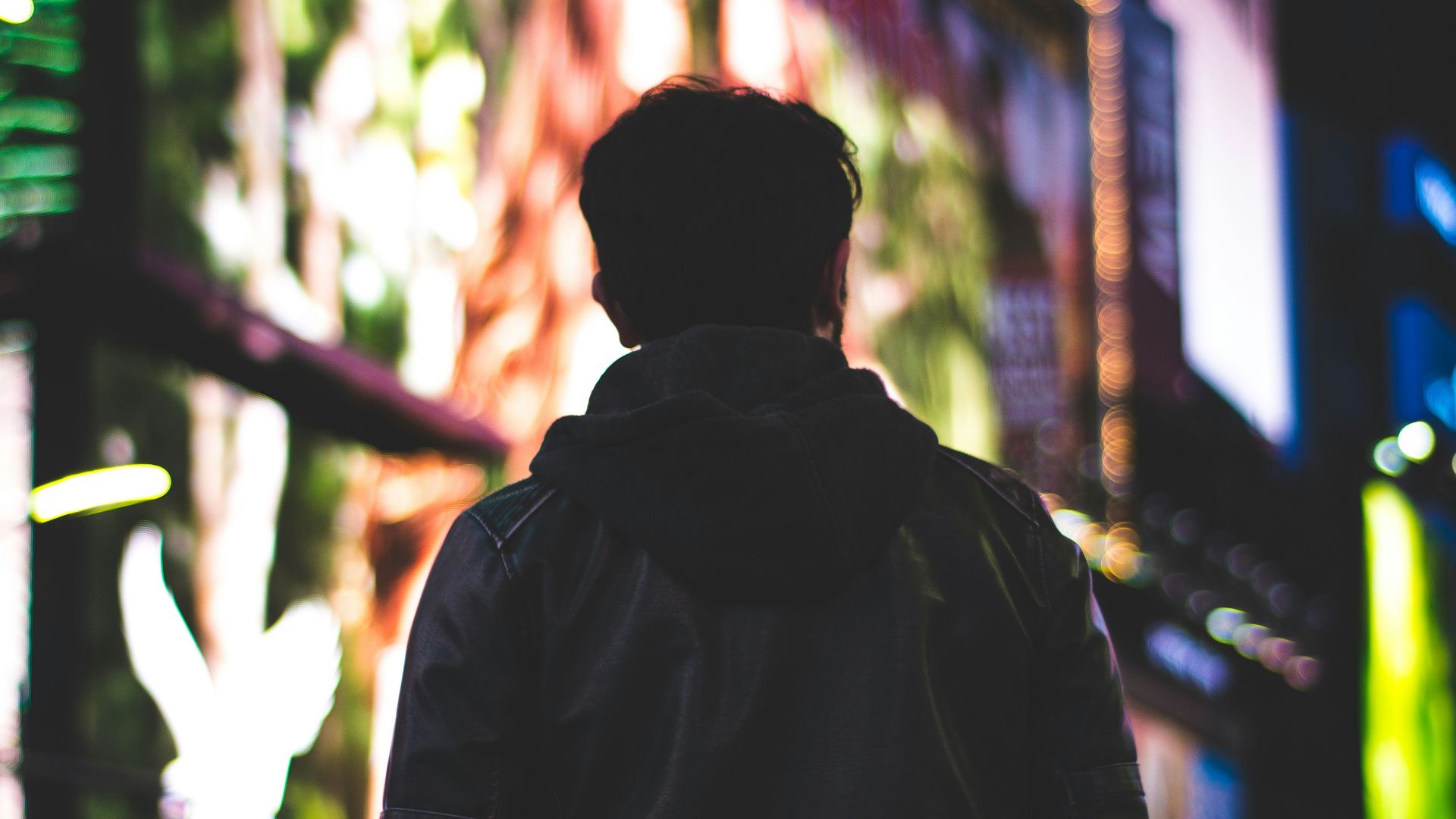closeup photo of man wearing black hoodie jacket