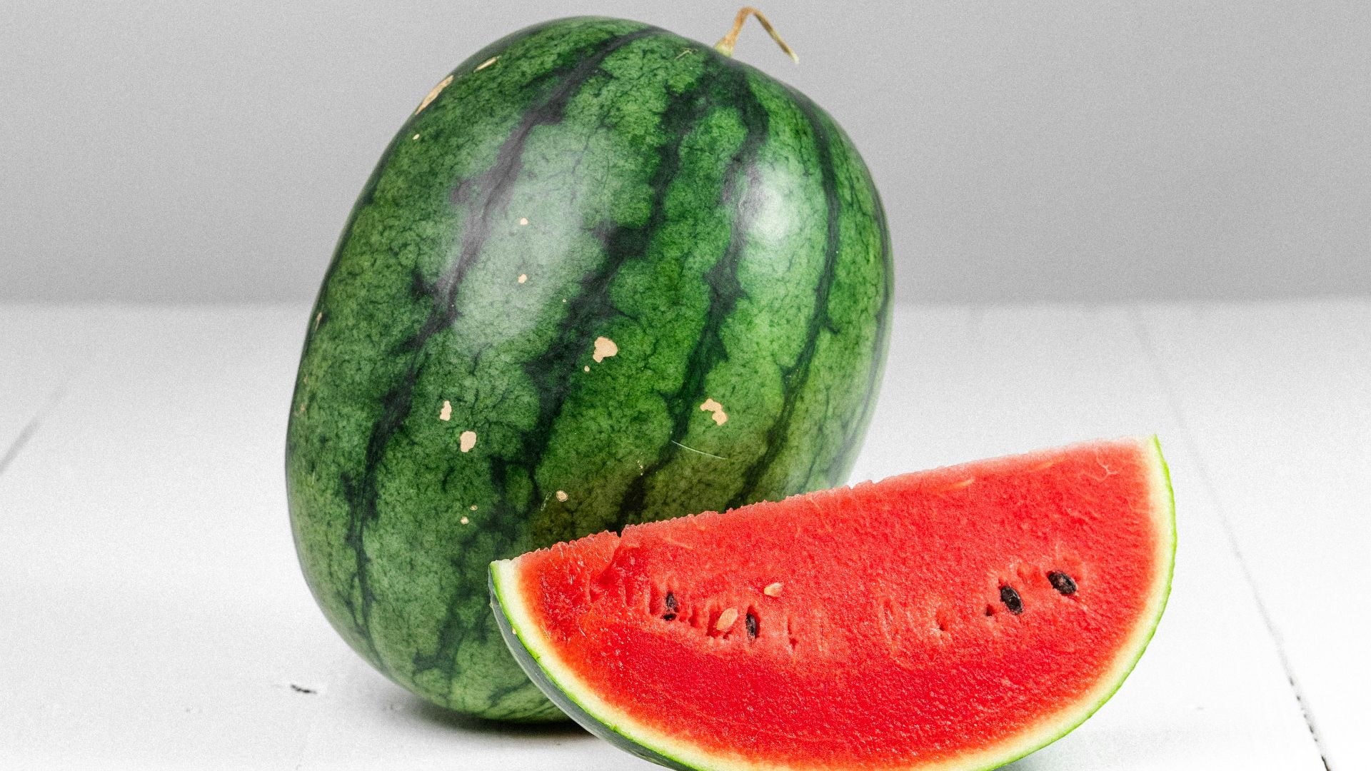 watermelon fruit on white table