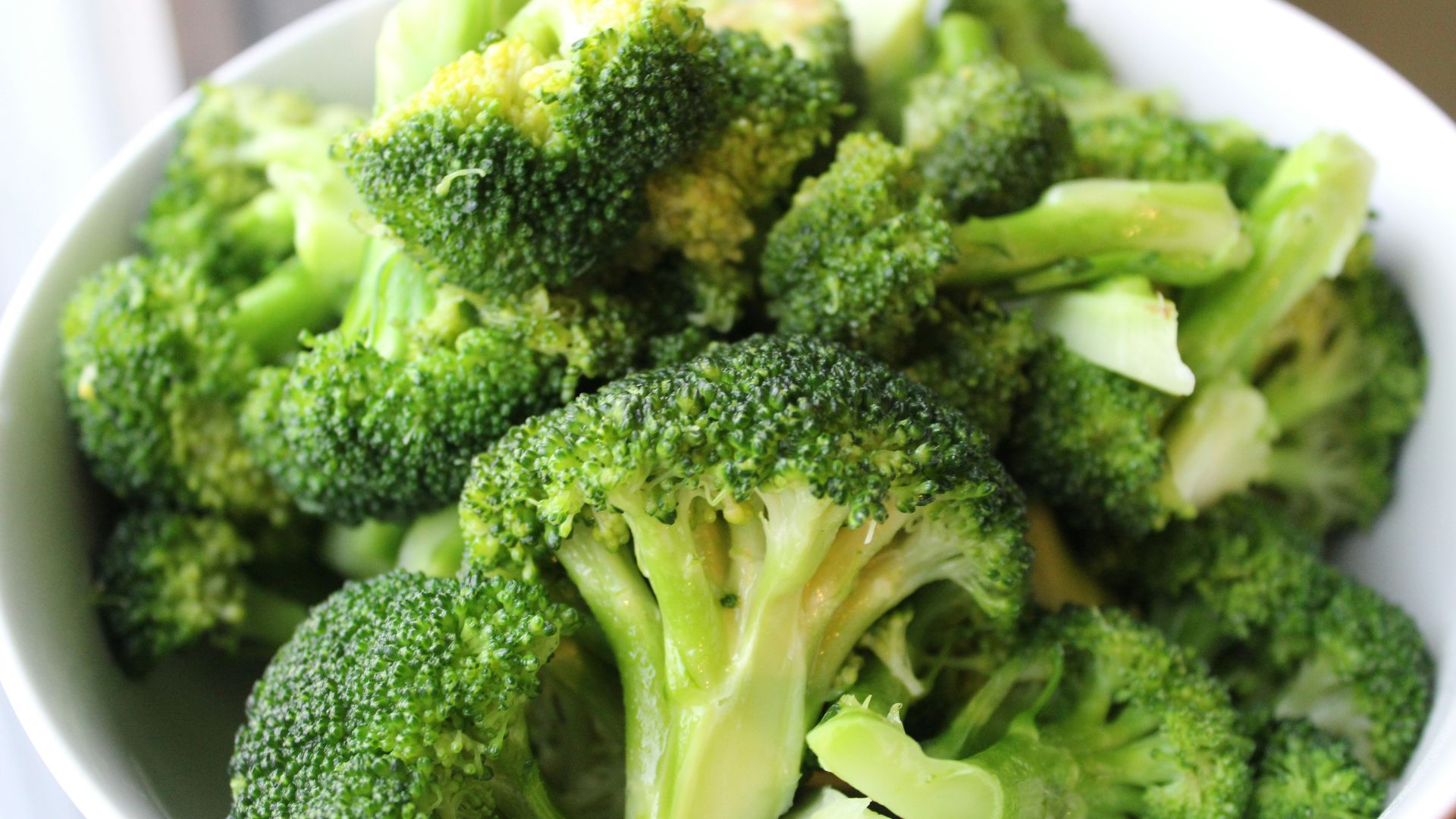 green broccoli on white ceramic plate