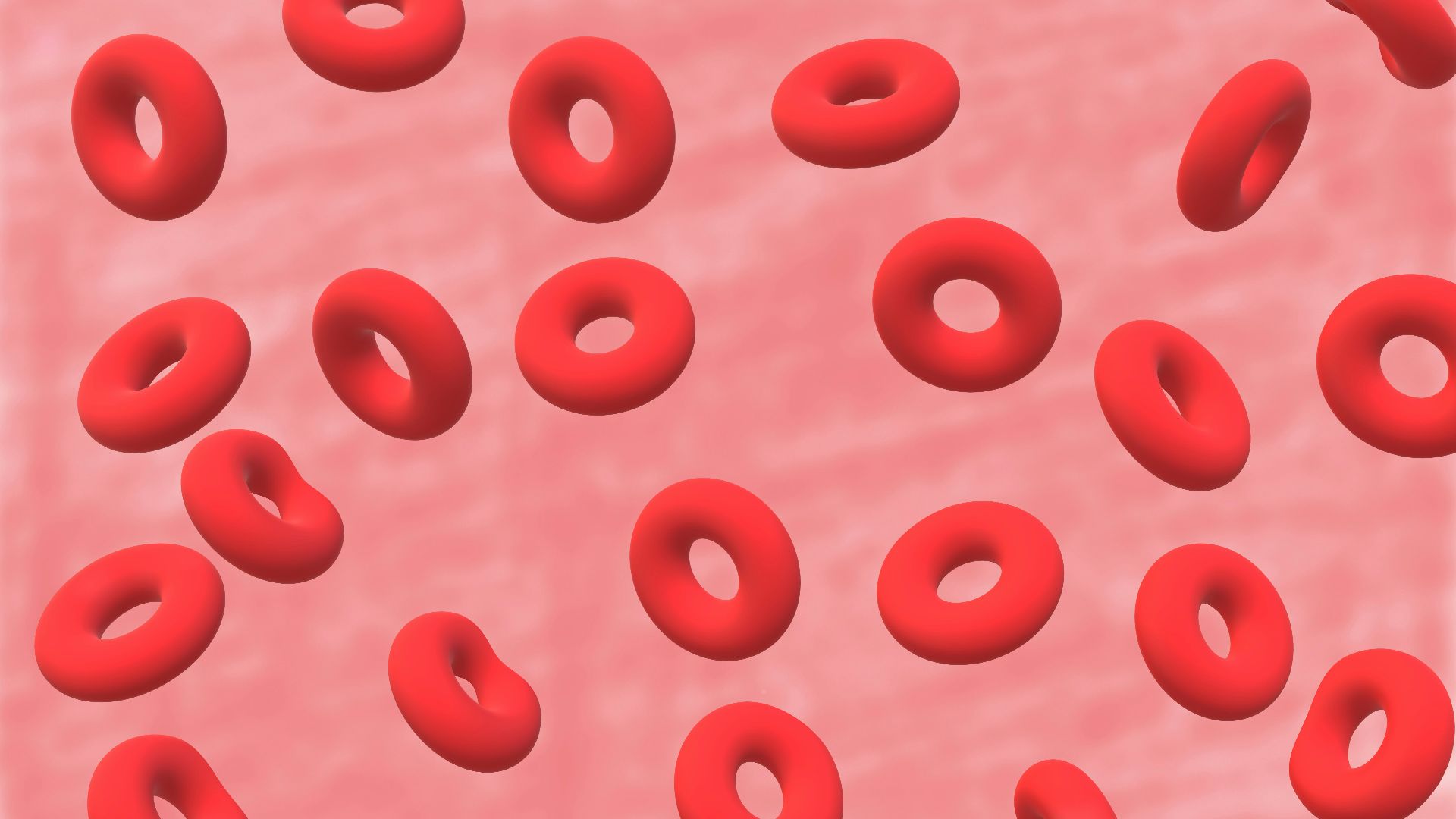 a bunch of red donuts floating in the air