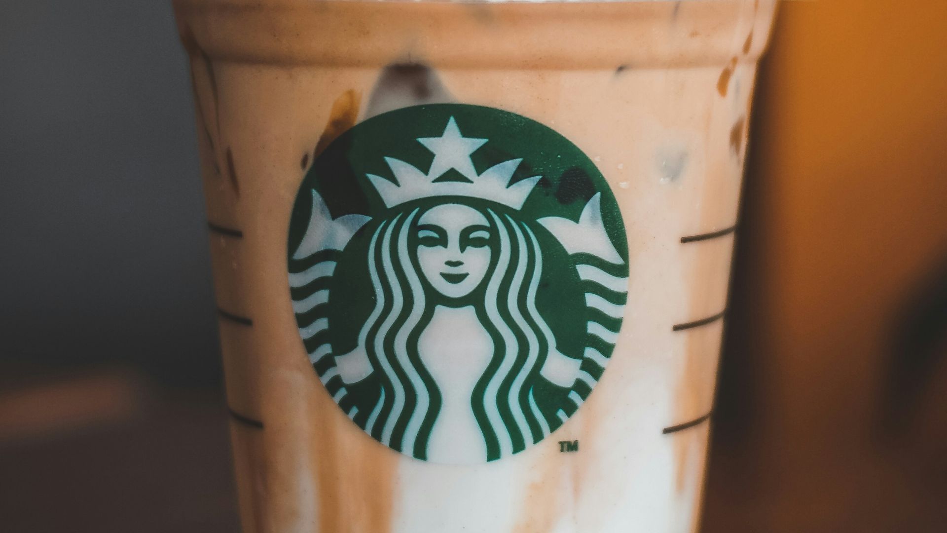 white and brown starbucks cup