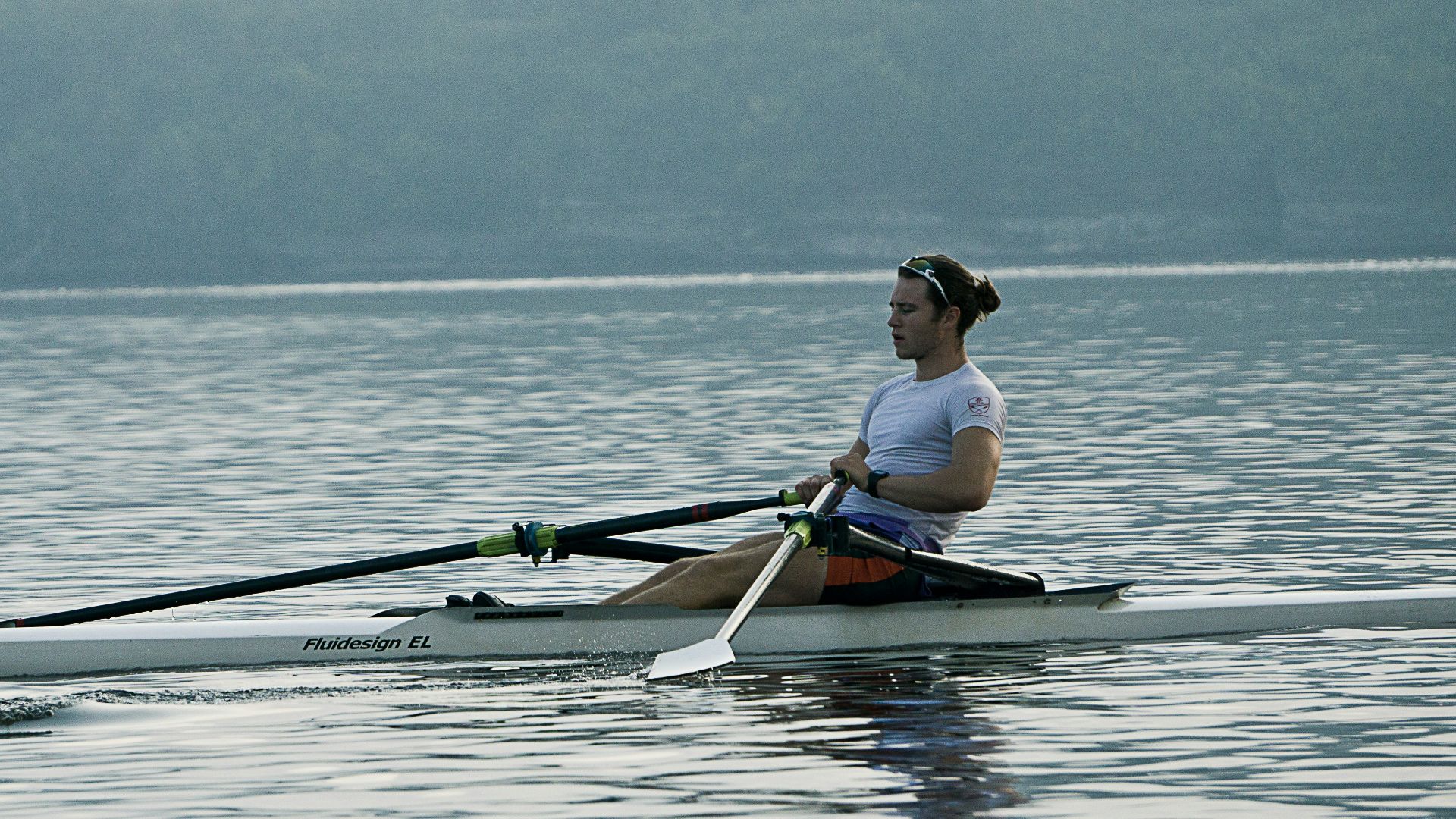 man riding on kayak