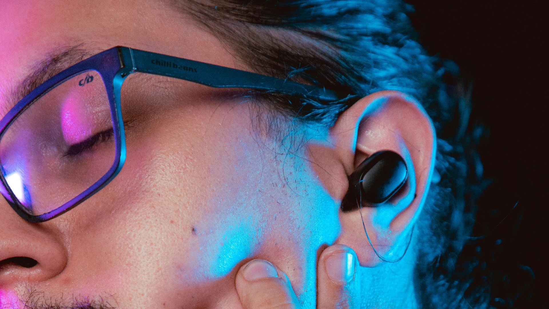 man in black framed eyeglasses