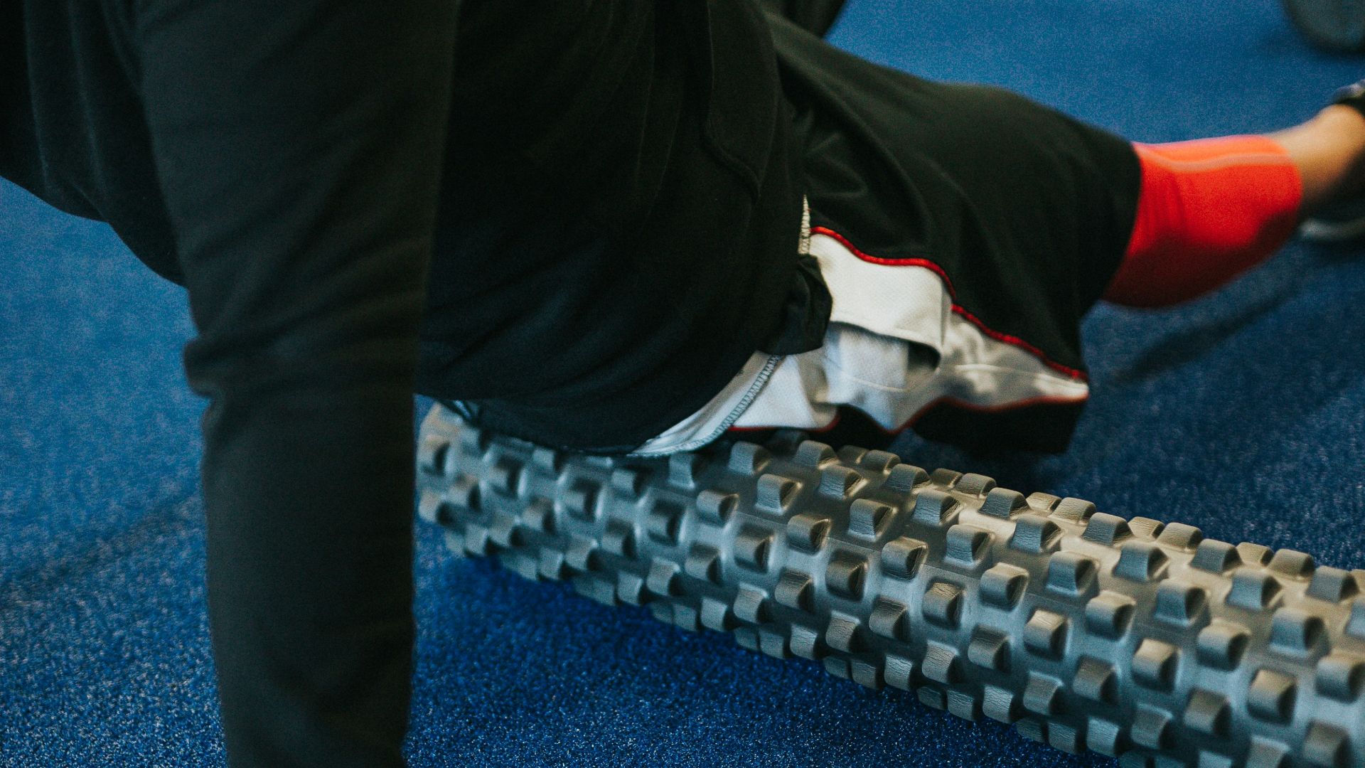 person in black pants and white shirt